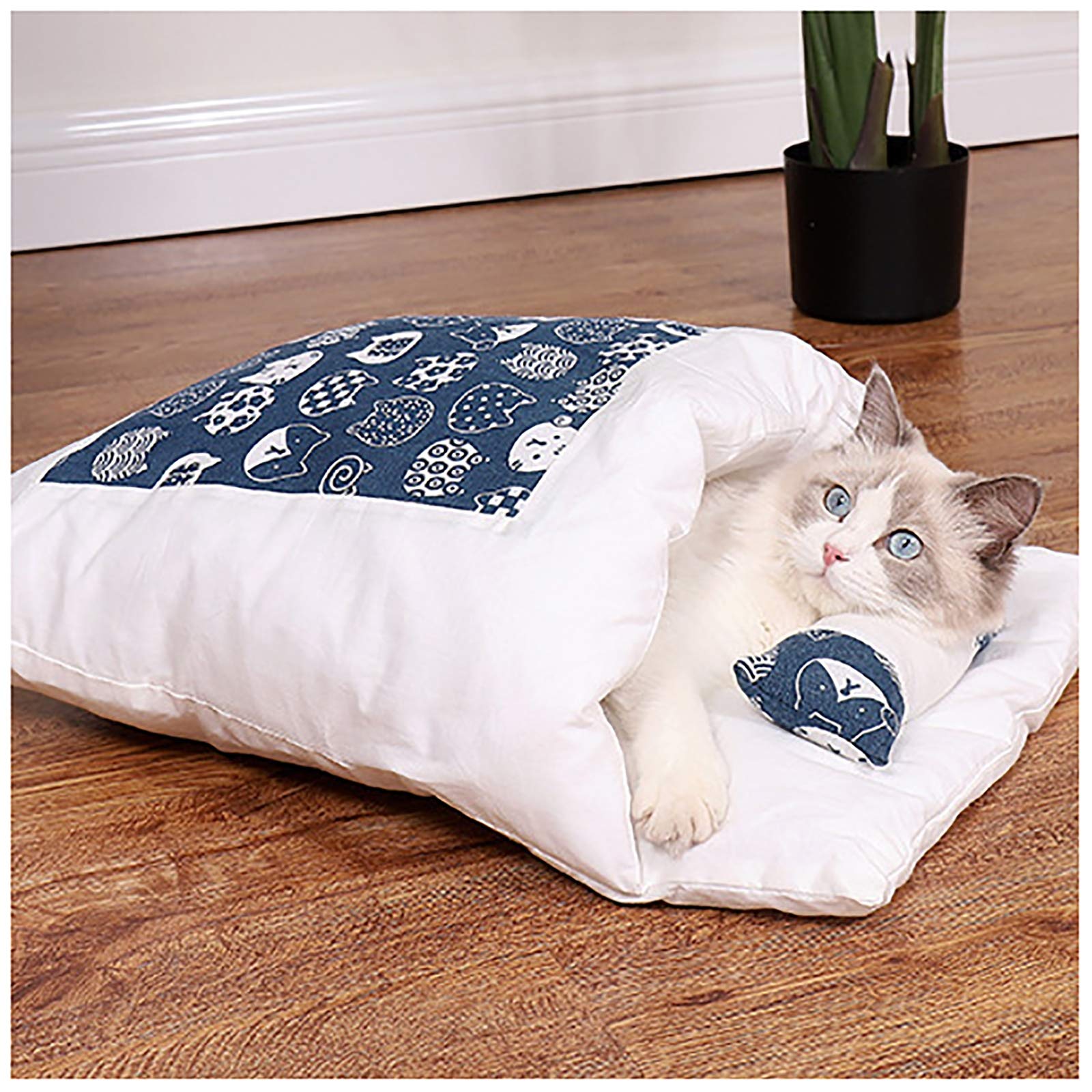 Grotte de chat douillette pour des siestes d'hiver bien au chaud dans un lit fermé amovible L