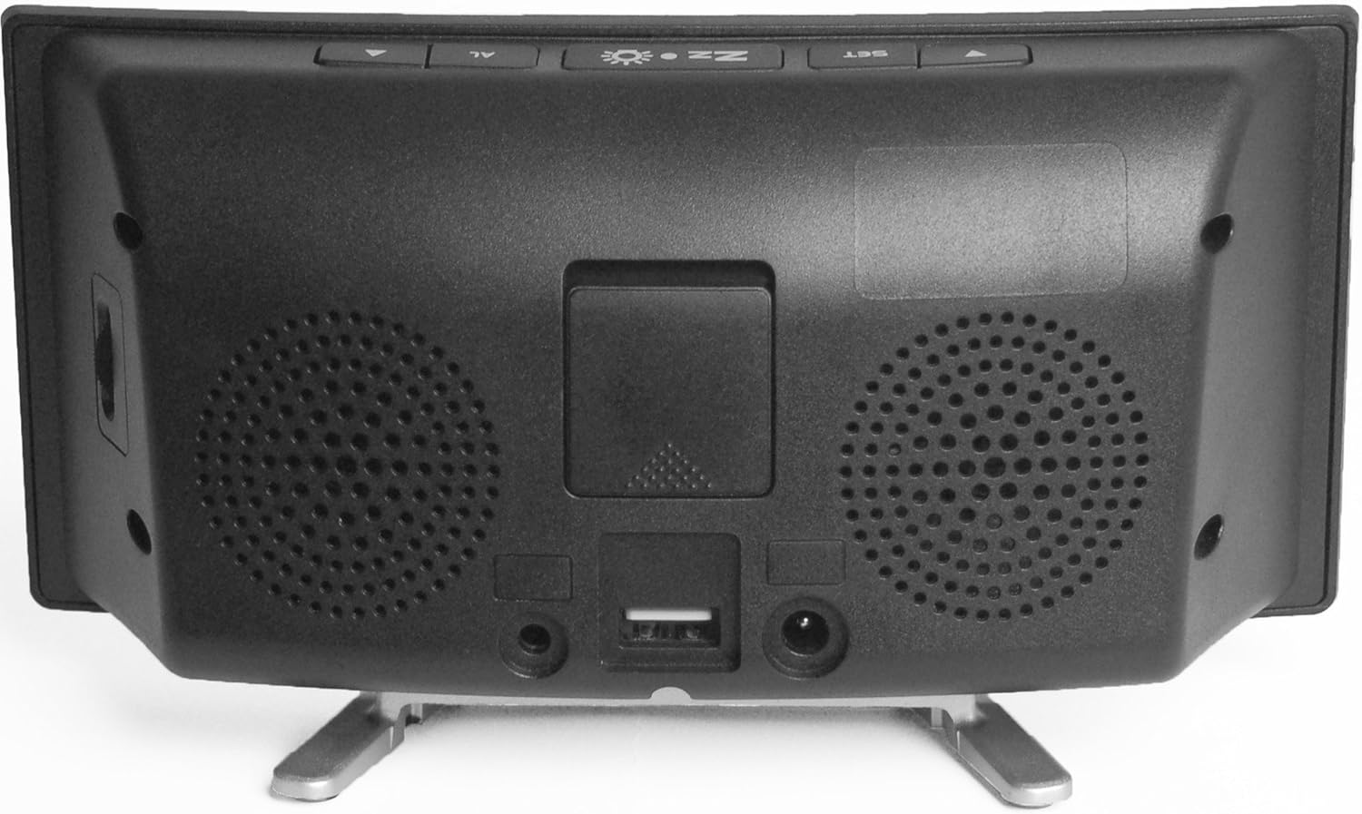 דערציען view of the alarm clock showing the power input, USB charging port, and shaker pad port.