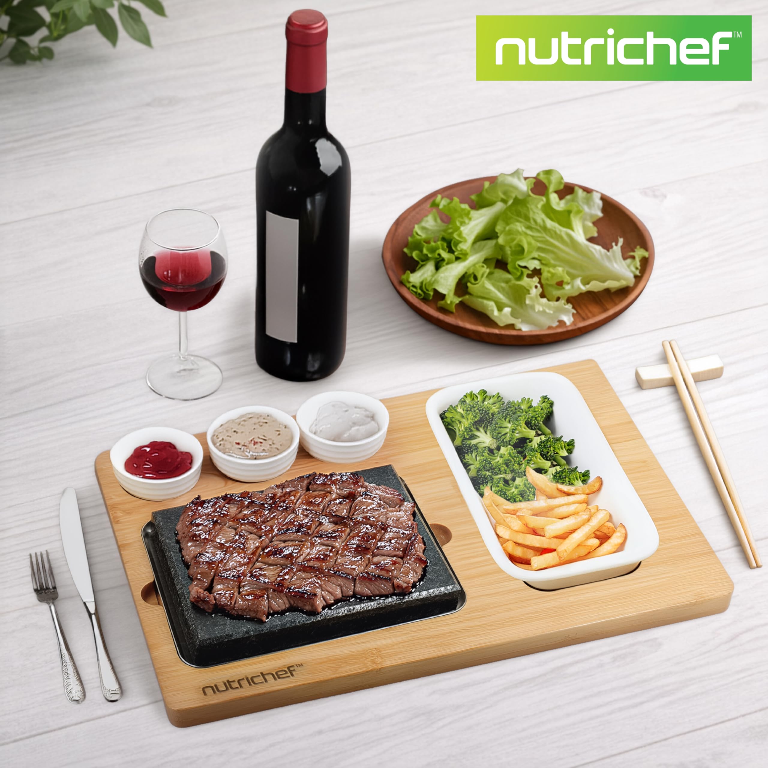 NutriChef Heißer Stein Grillplatte – Tischgrill-Set mit Bambus und Keramik Ideal für Steak und Dinner - Natürliches Granit-Kochset - Servierplatte mit Saucenschälchen