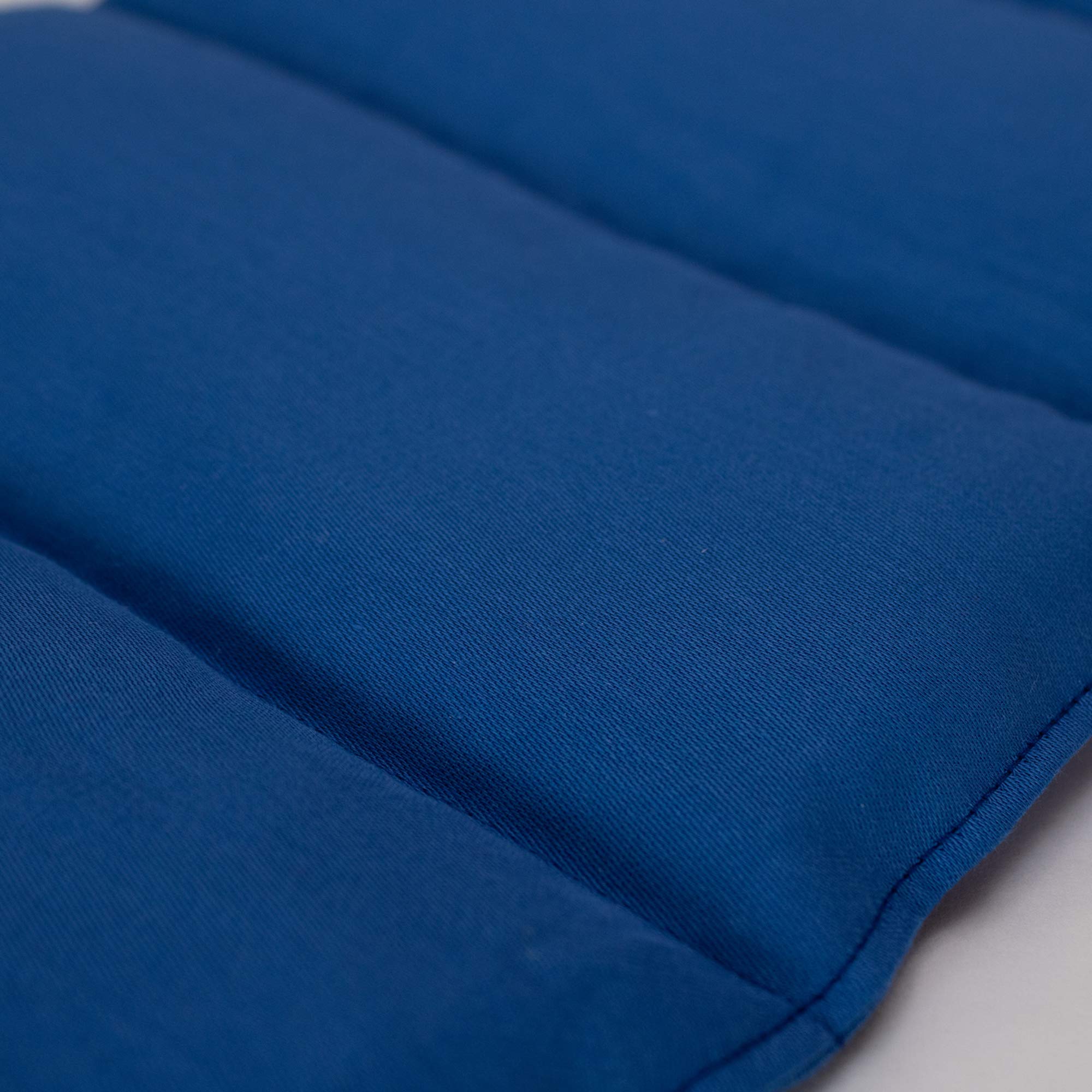 Cuscino con semi di lino, 75x20cm. Cuscino termico per forno, microonde e frigorifero. (Cotone Bio blu oscuro, diviso en 8 compartimenti)