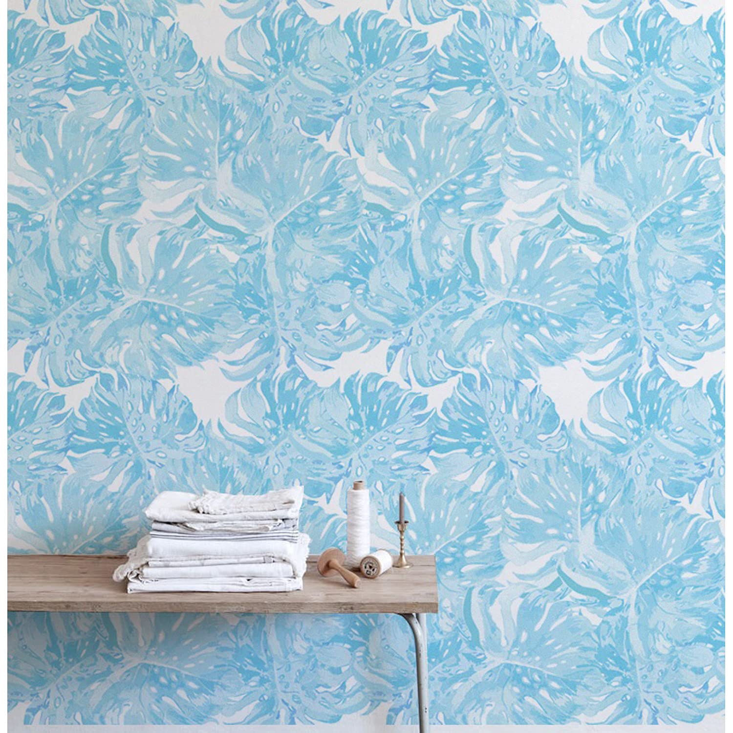 Papier peint feuille de palme tropicale pour créer une ambiance jungle dans la chambre