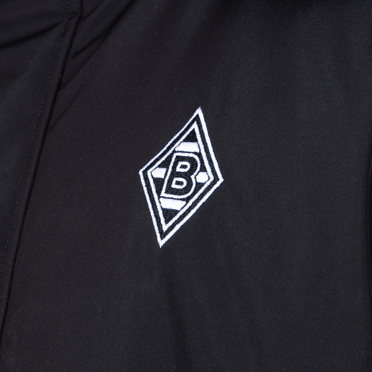 Borussia Mönchengladbach Übergangsjacke „Spring“ | Offizieller Fanartikel Fohlenshop | Gladbach Jacke Dunkelgrau Kapuze Abnehmbar