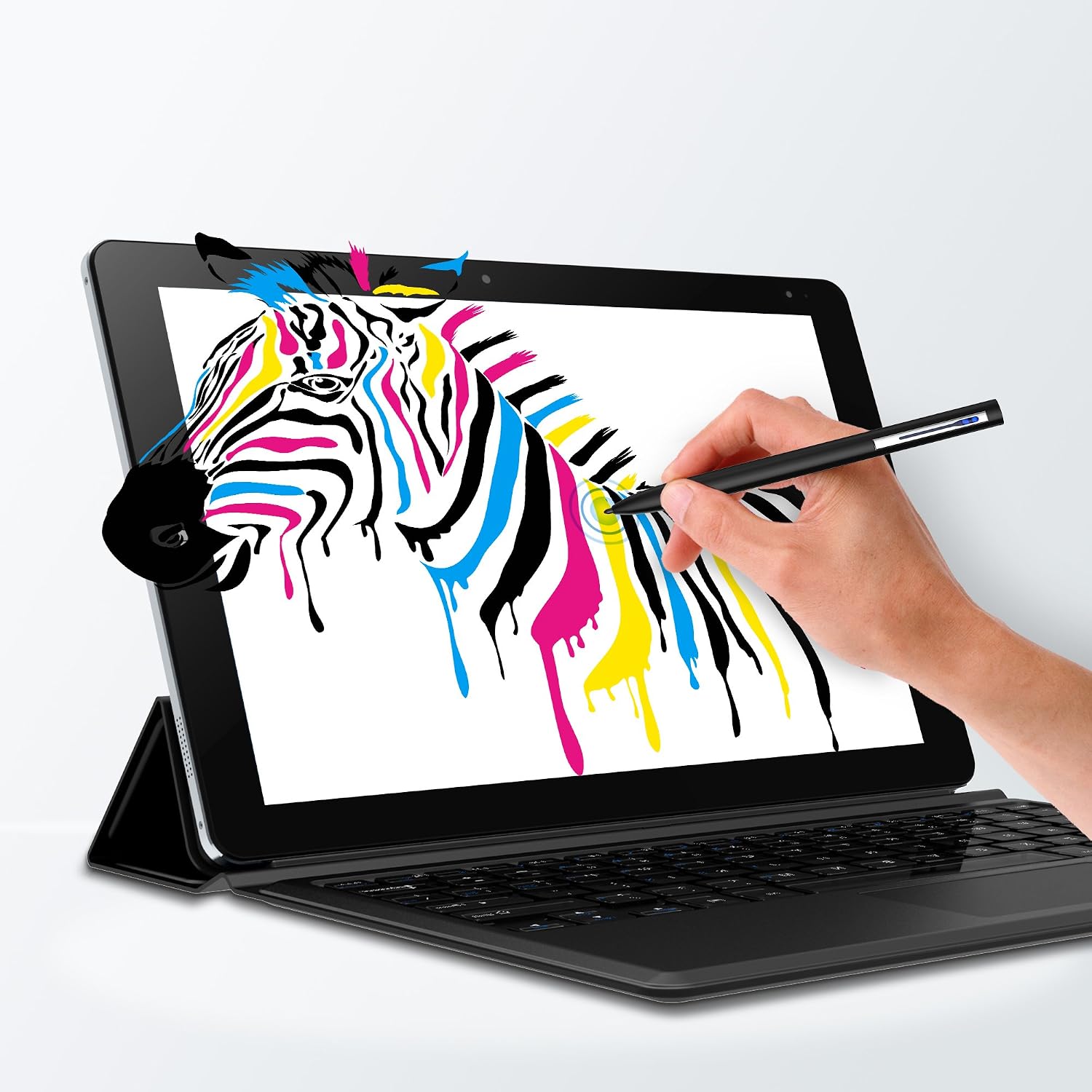 A hand using a stylus pen to draw a colorful zebra on the CHUWI Hi10 Plus tablet screen, which is attached to a keyboard case.