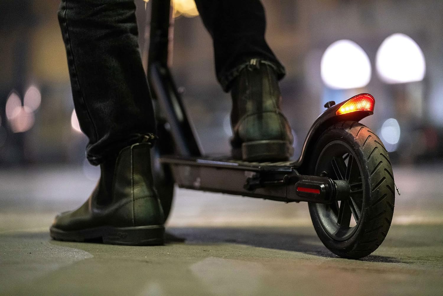 Close-up of Nilox S1 E-Scooter rear wheel and LED light