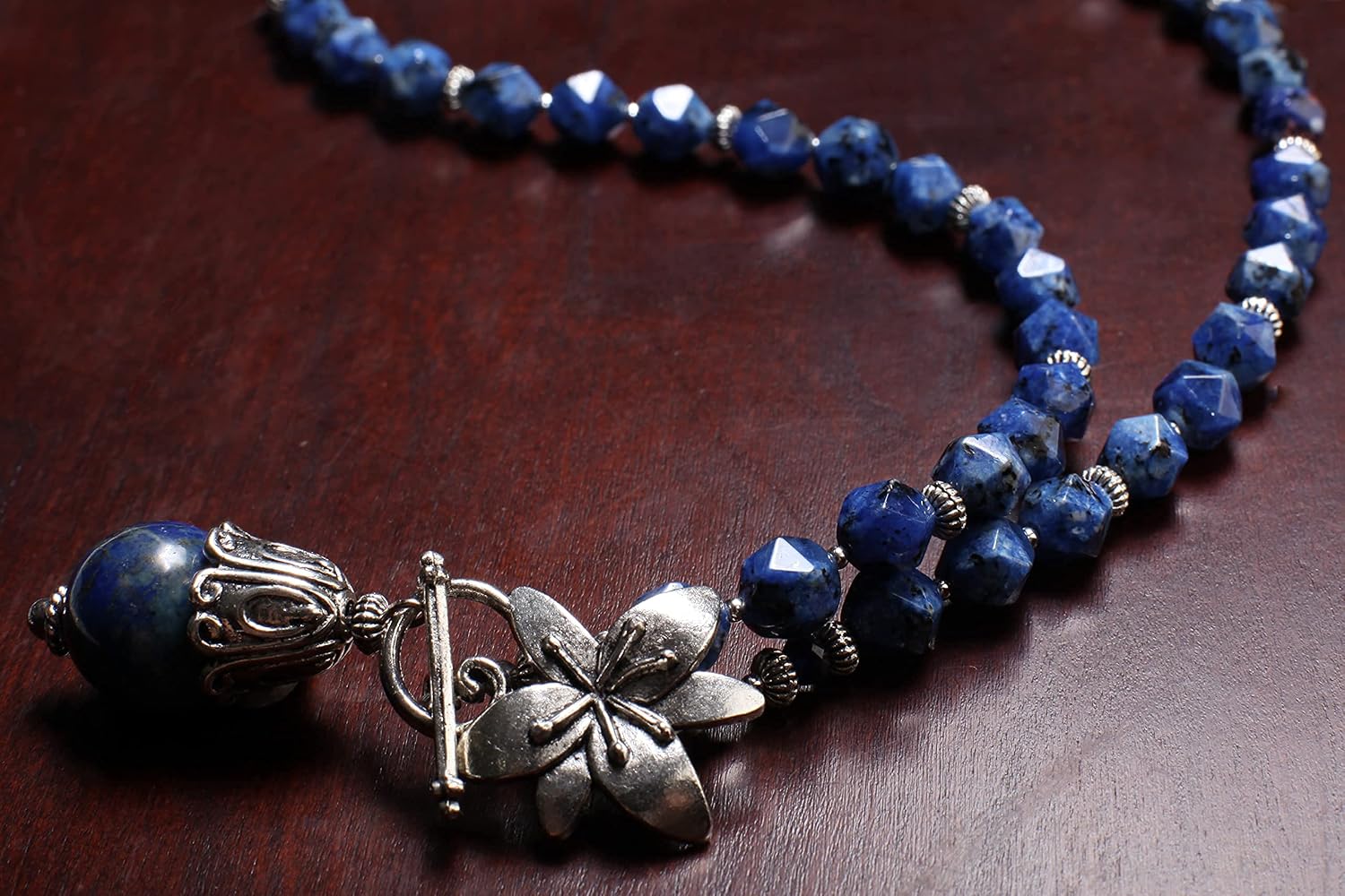 Lapis Lazuli Fancy Cap Pendant with Sodalite Faceted Hexagon Necklace Accented with Bali Style Flower Toggle