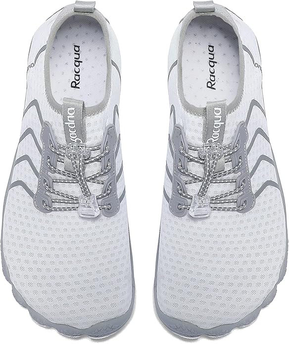 These water shoes feature a sleek and stylish design, making them suitable for both casual wear and outdoor activities. The lightweight construction and breathable fabric ensure that your feet stay dry and comfortable even in wet conditions. The adjustable strap allows for a secure and customized fit, while the reinforced toe cap provides added protection against rocks and debris in the water. Overall, Racqua Water Shoes are a practical and stylish choice for anyone looking to stay comfortable and safe during their water adventures. Description by ChatGPT.