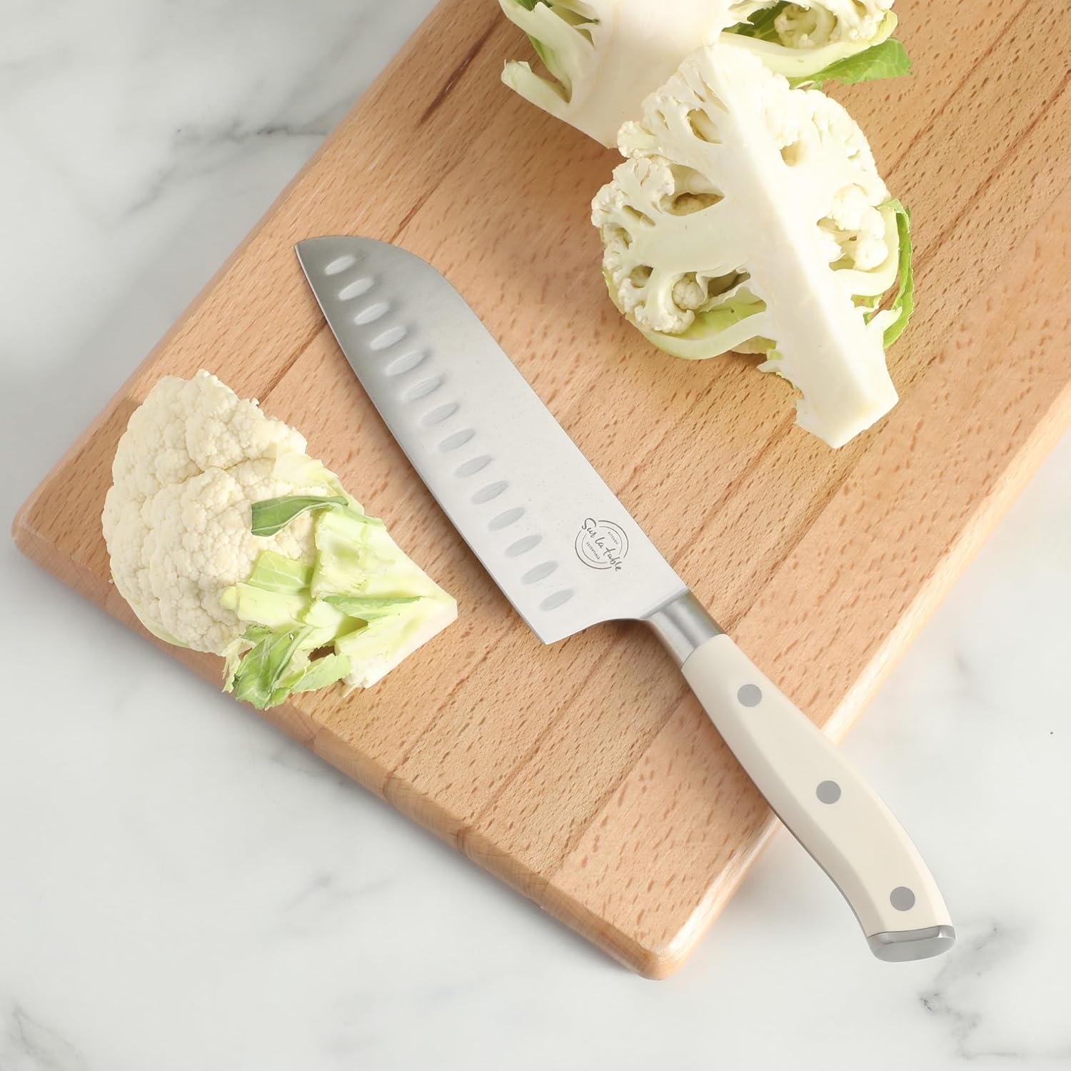 Sur La Table Kitchen Essential Tasting Kitchen German Steel Santoku Knife, 7-Inch Stainless Steel Blade – Professional Kitchen Knife with White Handle and Forged Full Tang
