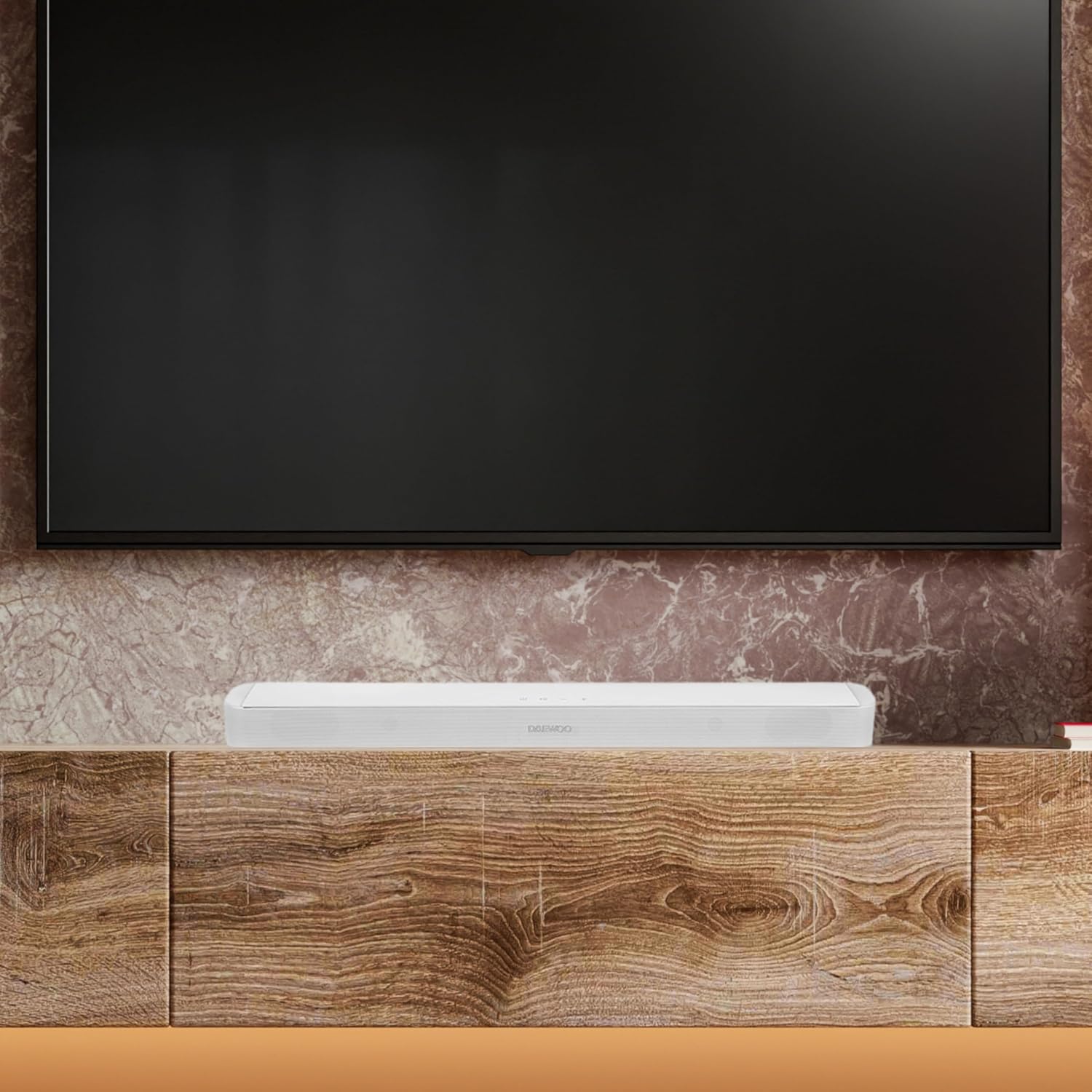 Select Sound soundbar placed on a wooden cabinet below a television.