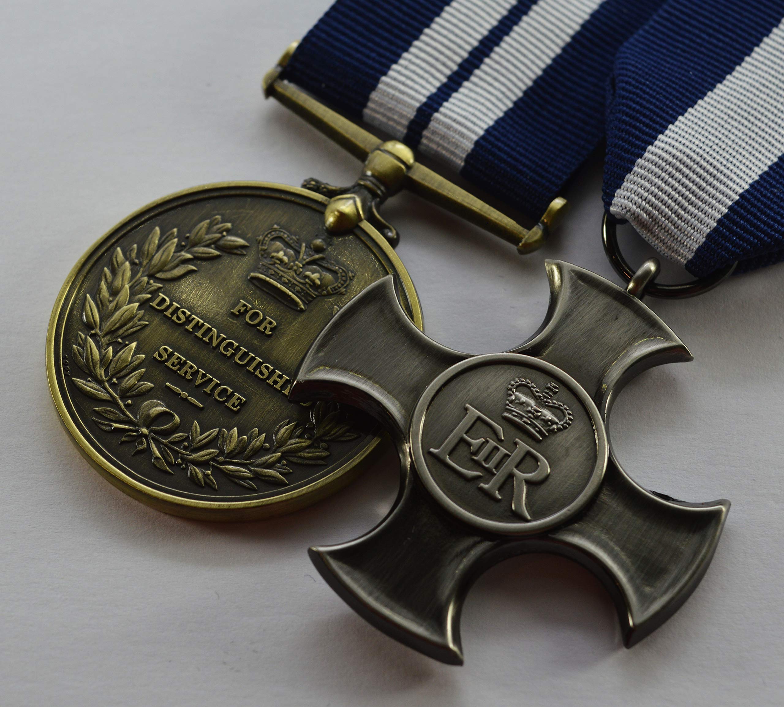 The Commemorative Coin Company Pair of Elizabeth II Medals for Distinguished Service. DSM ER-II Distinguished Service Cross.