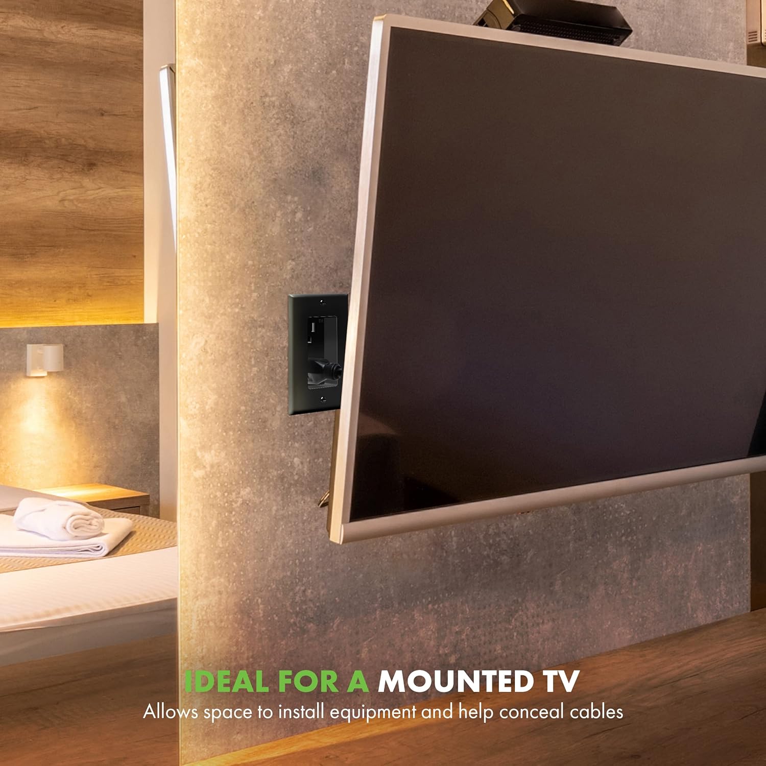 Recessed outlet installed behind a wall-mounted TV.