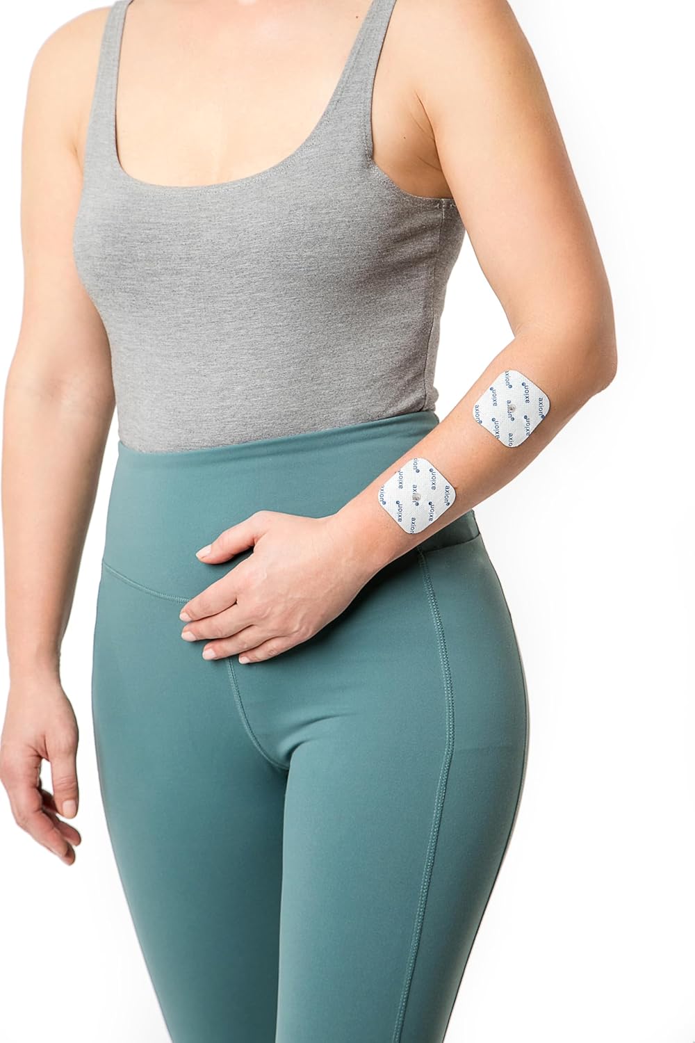 Electrodes applied to a person's arm.