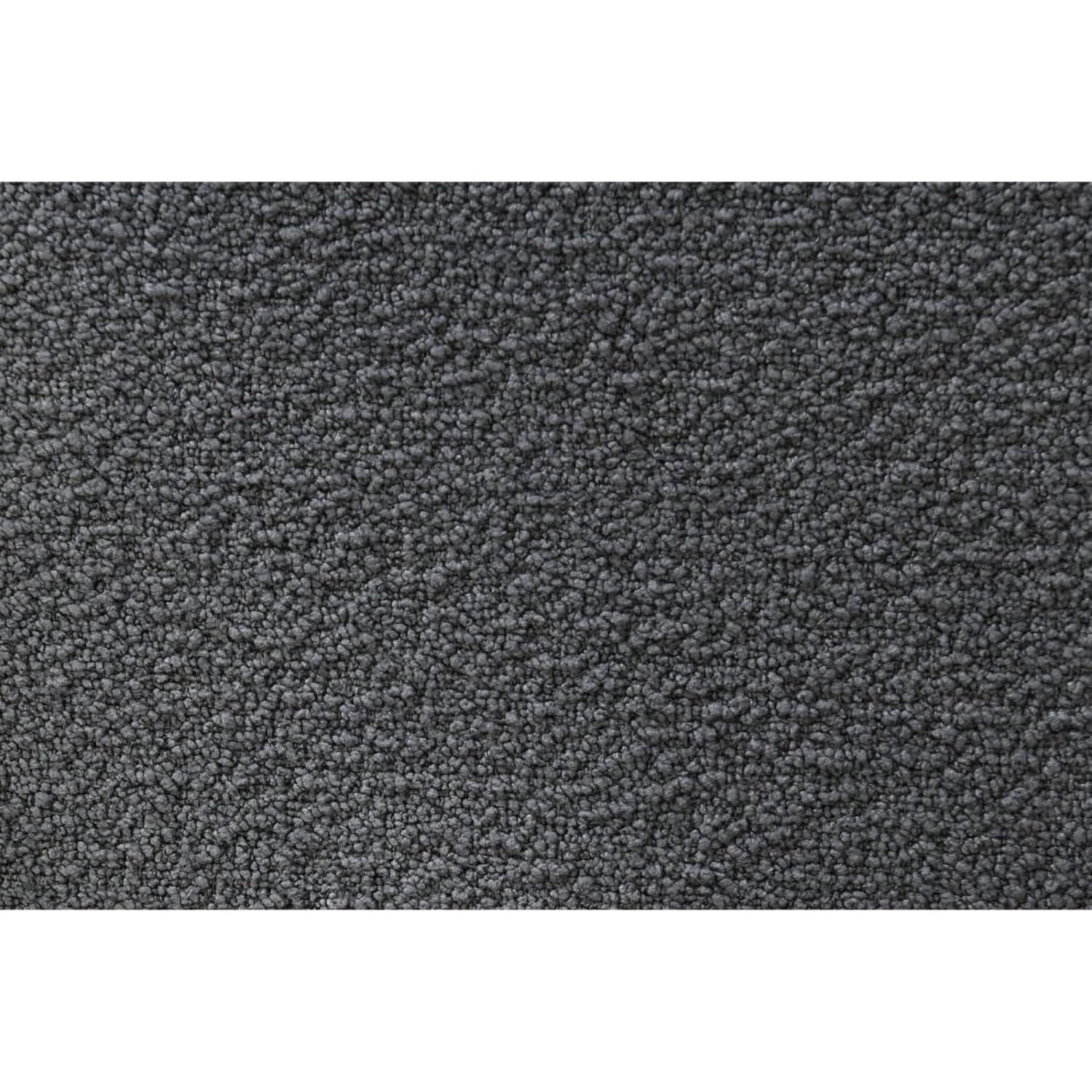 Close-up of the dark grey fabric texture of the bed