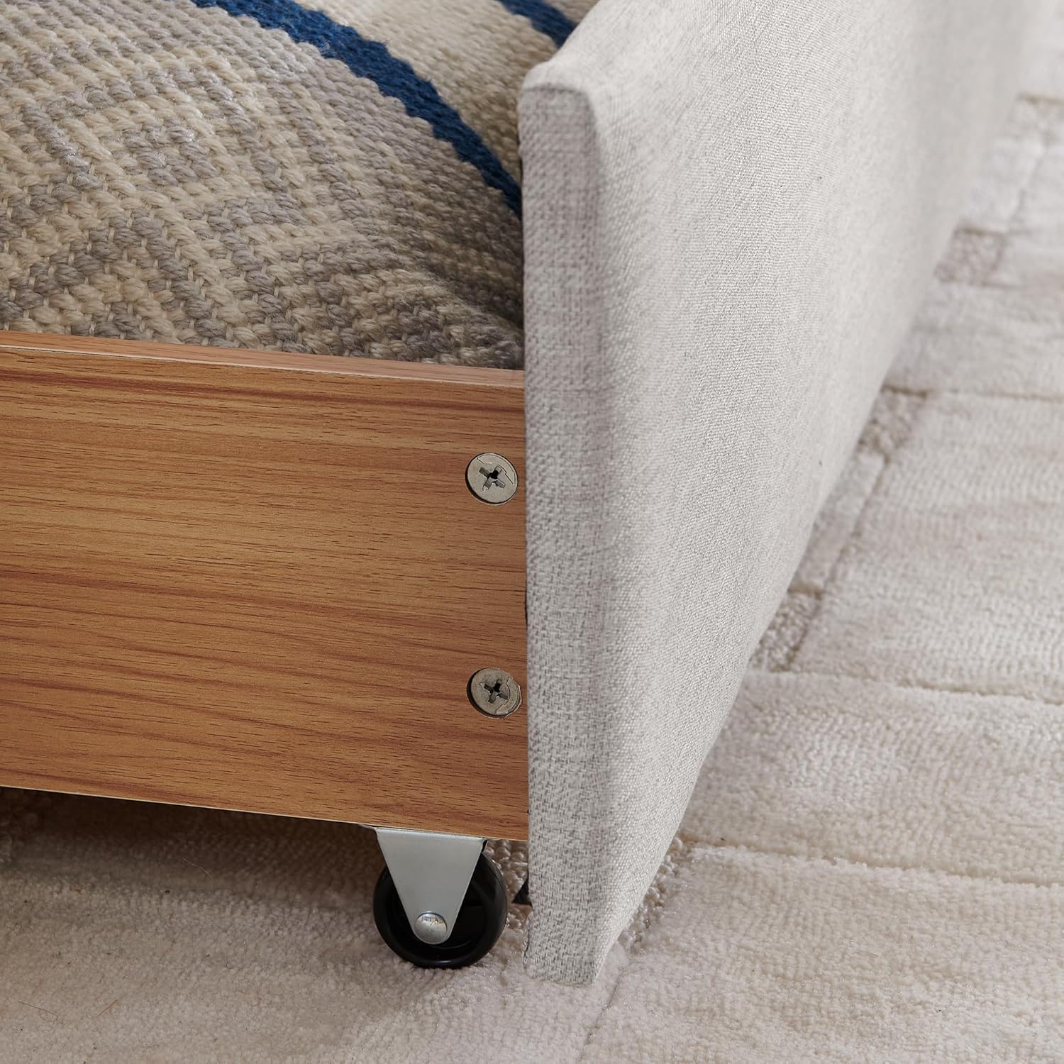 Close-up of drawer wheel mechanism