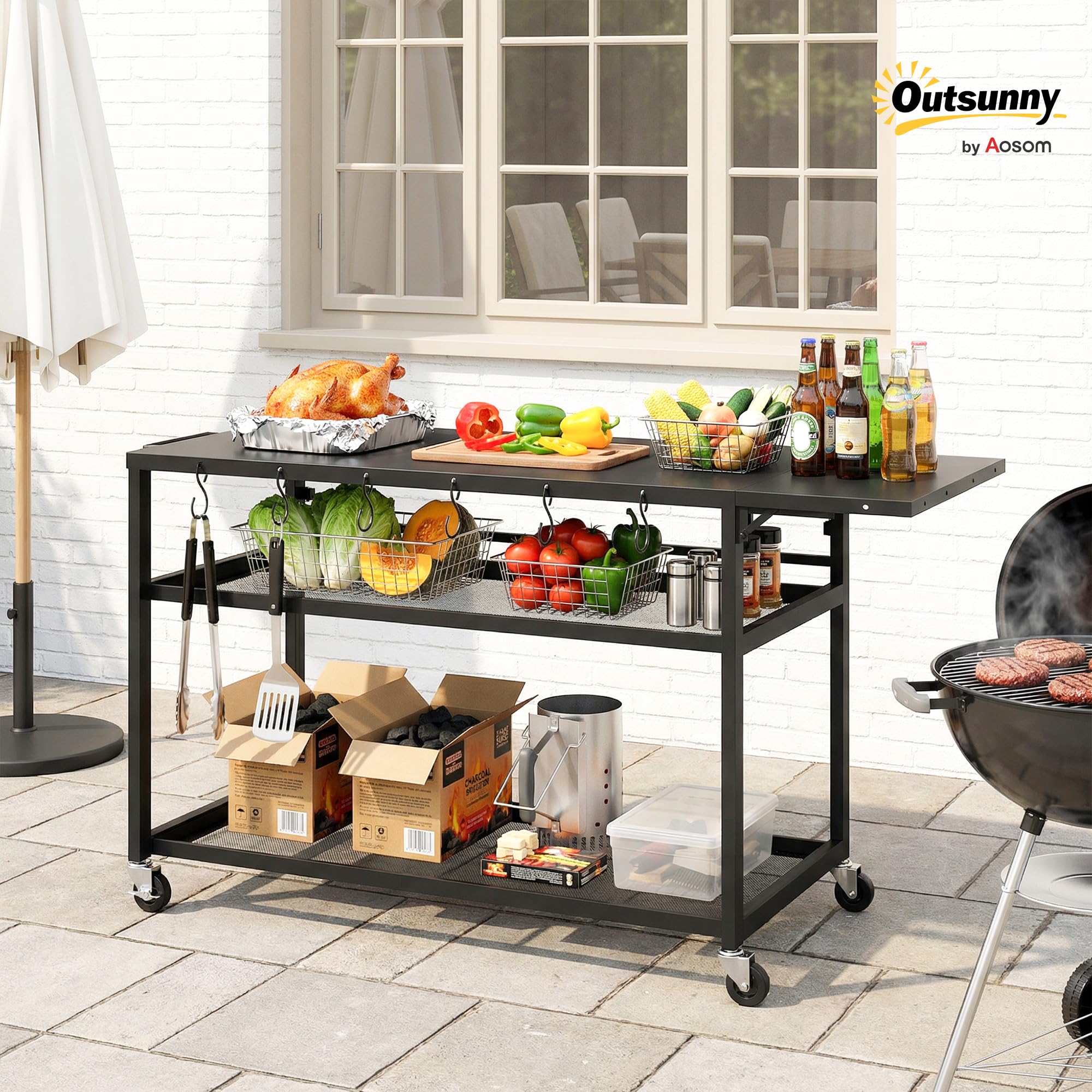 Outsunny - Carro de barbacoa con ruedas, isla de cocina con bandeja lateral plegable, tres estantes, ganchos y punzonado, 133 x 48,5 x 82 cm, color negro
