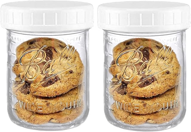 Wide Mouth Mason Jars 16 oz - (2 Pack) - Ball Wide Mouth 16-Ounces Pint Mason Jars with White M.E.M Food Storage Plastic Lids, Caps Fit Ball and Kerr Wide Mouth - For Storage, Freezing, Leak Proof,