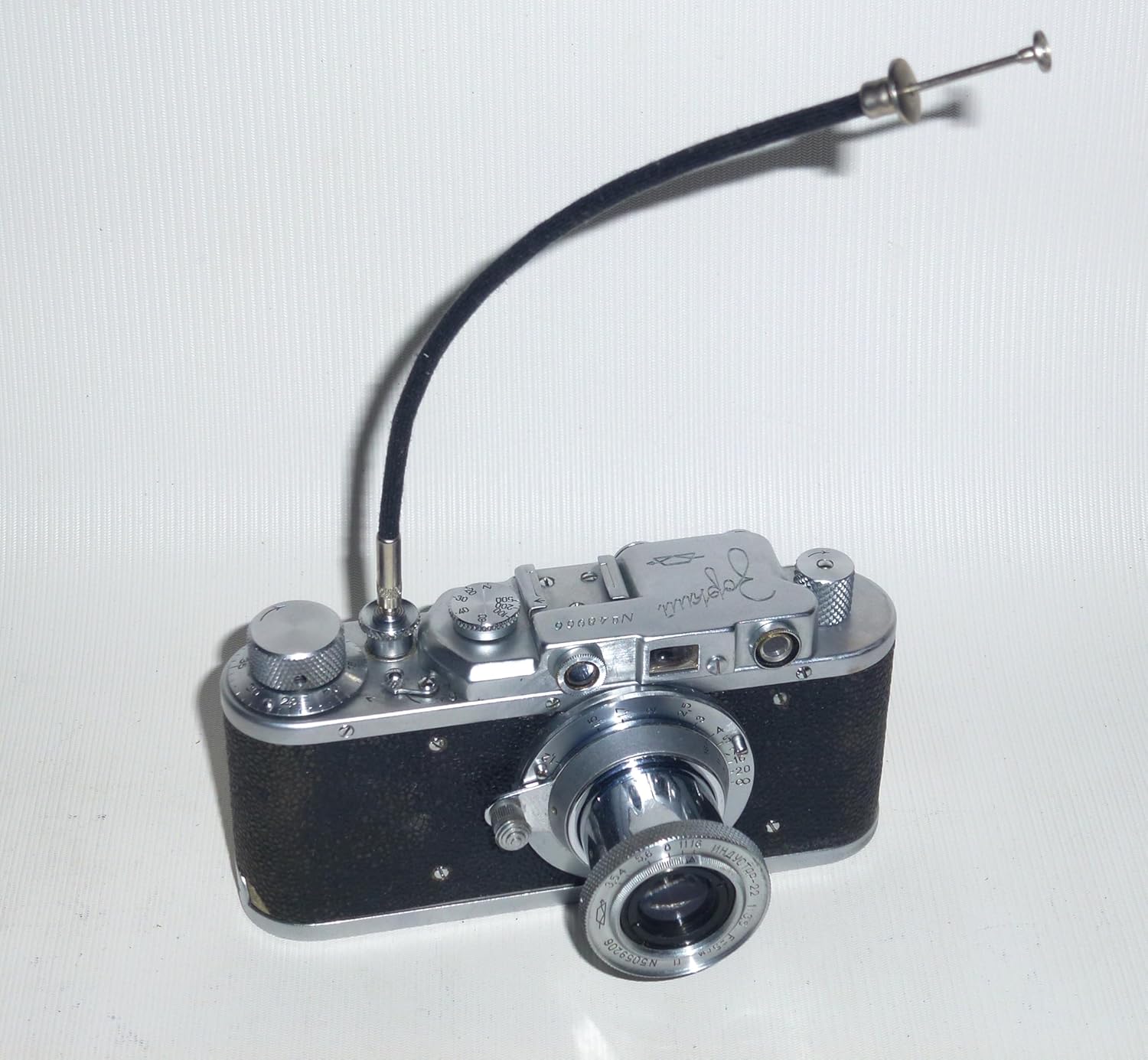 Zorki-1 camera with a shutter release cable attached to the shutter button.