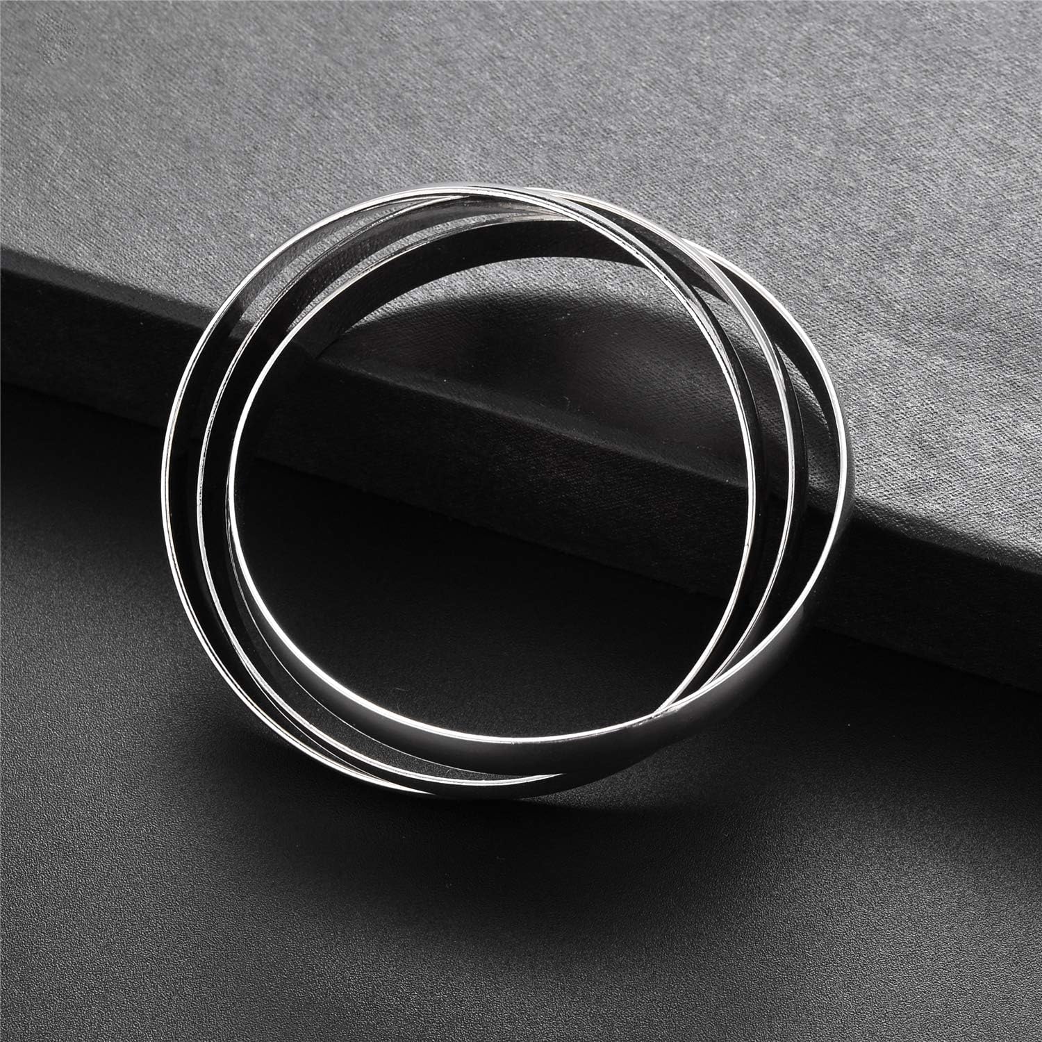 Jones New York Plain Silver Three Intertwined Bangle Bracelet: Clothing, Shoes & Jewelry