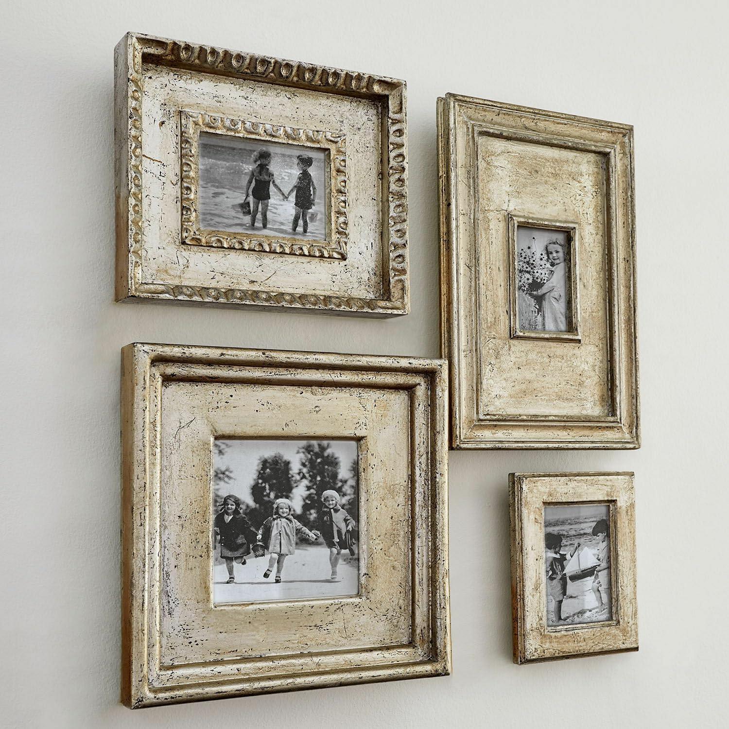 Loberon Bilderrahmen 4er Set Holny, antiksilber | Unterschiedliche Rahmen-Designs, Nostalgischer Charme, Wandschmuck, Wanddekoration, Mangoholz, Spiegelglas