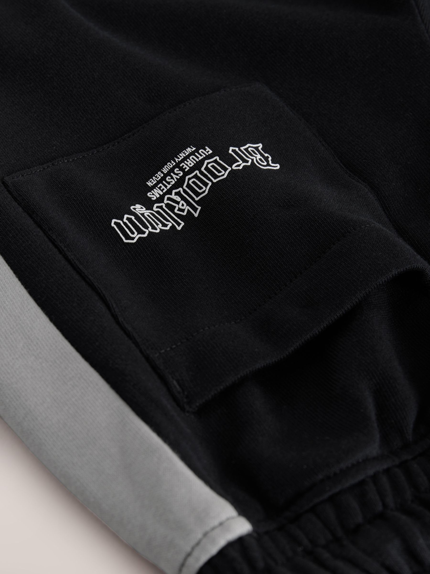 NEXT Niños Conjunto de sudadera con cremallera y cuello alzado y pantalones de chándal