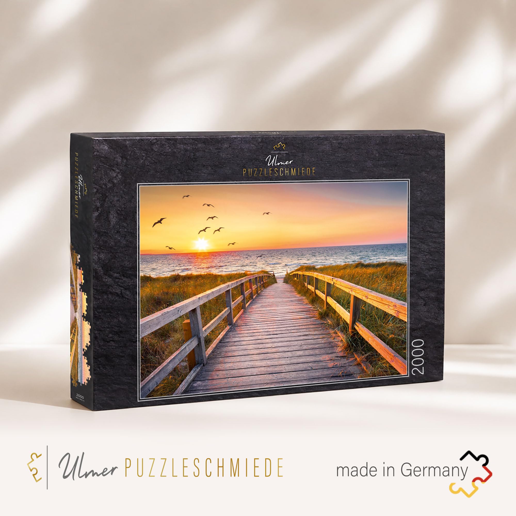 Ulmer Puzzleschmiede - Puzzle de noche en Sylt - Puzzle de 2000 piezas - Diseño del Mar del Norte con puesta de sol sobre las dunas en la playa de Sylt, Alemania