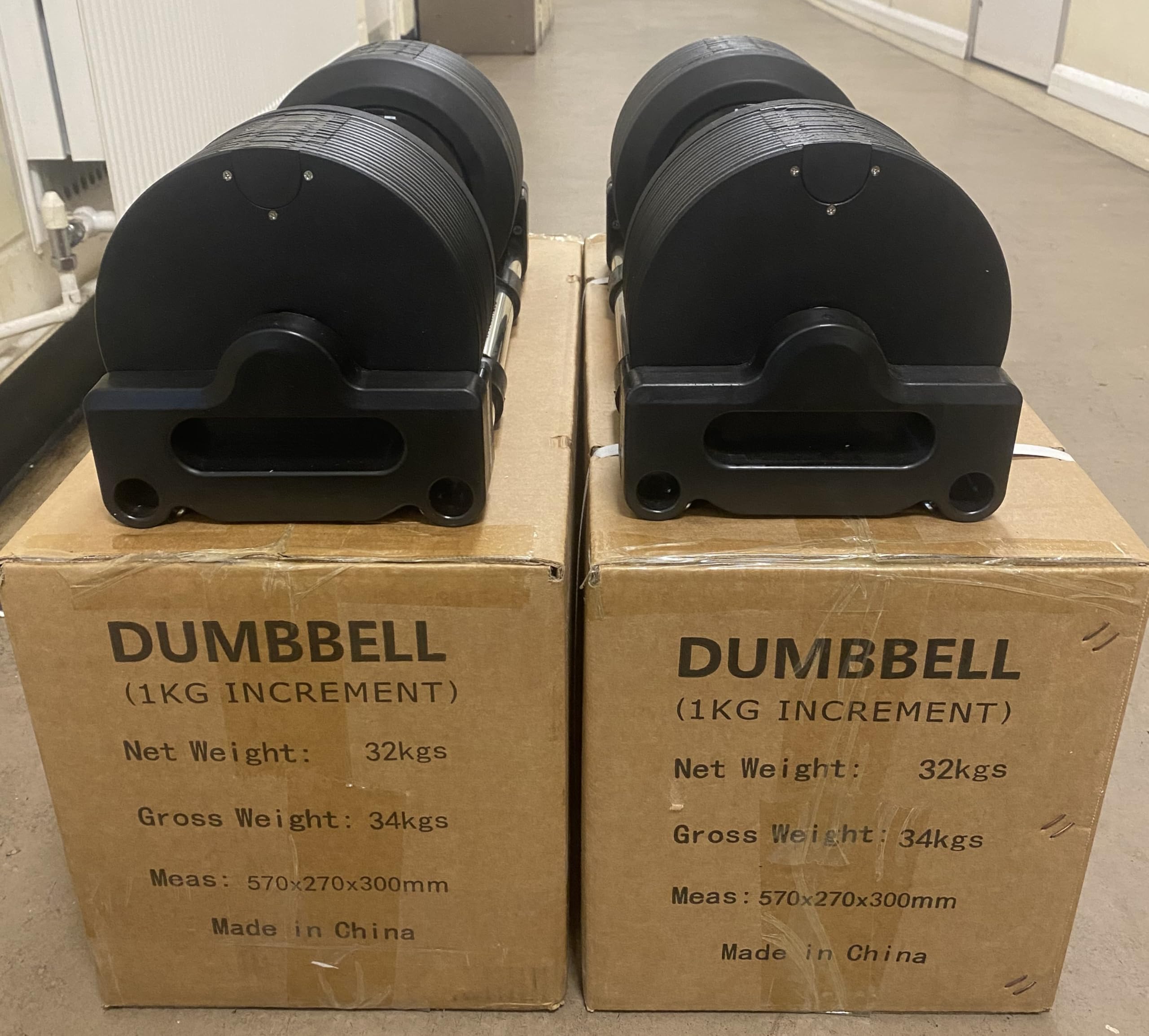 2 manubri regolabili da 32 kg (incrementi di 1 kg)