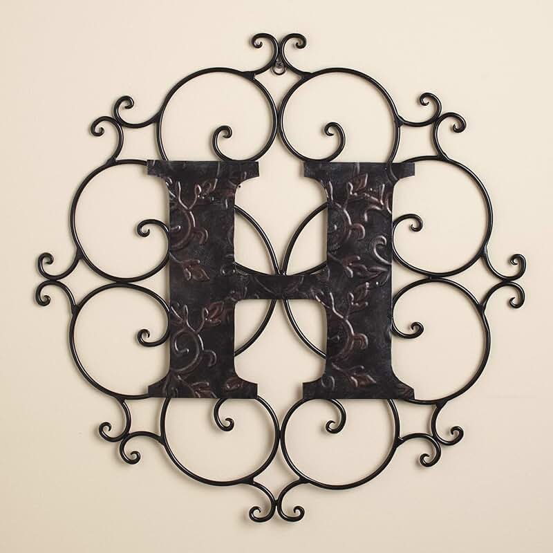 акант кованый. ковка буквы. кованые инициалы. ковка букв художественная. кованые инициалы.