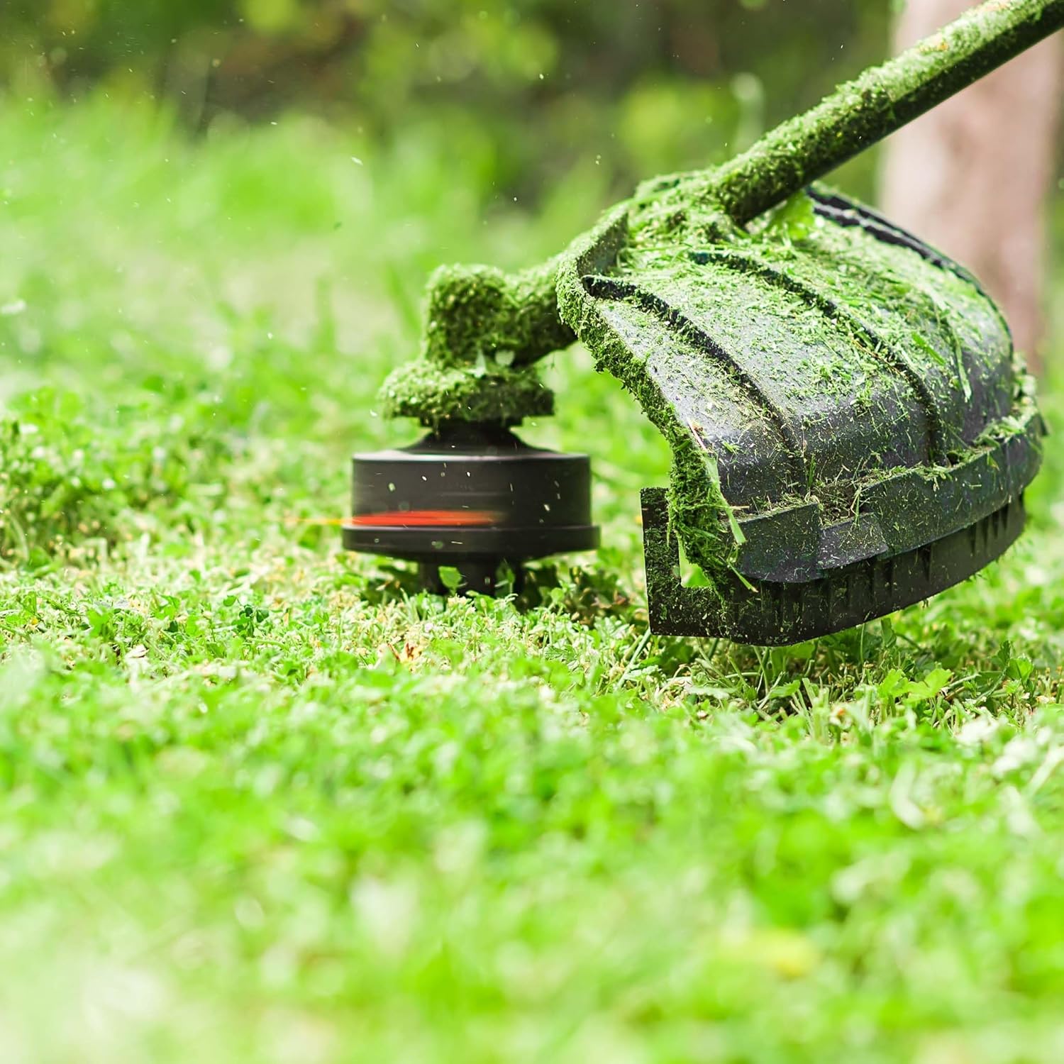 Brush cutter in action, trimming grass