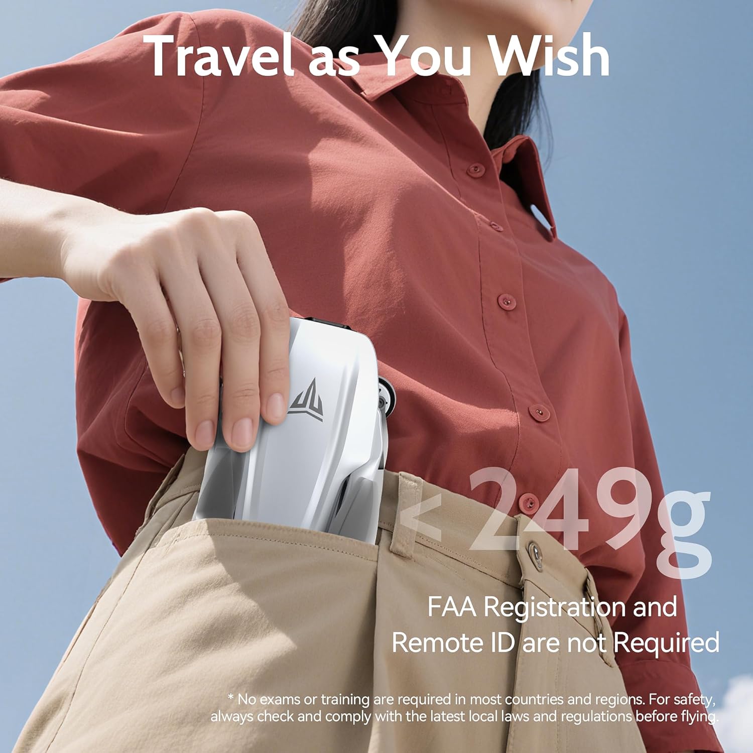 TizzyToy MT22 Drone being placed into a pocket, illustrating its compact size and light weight.