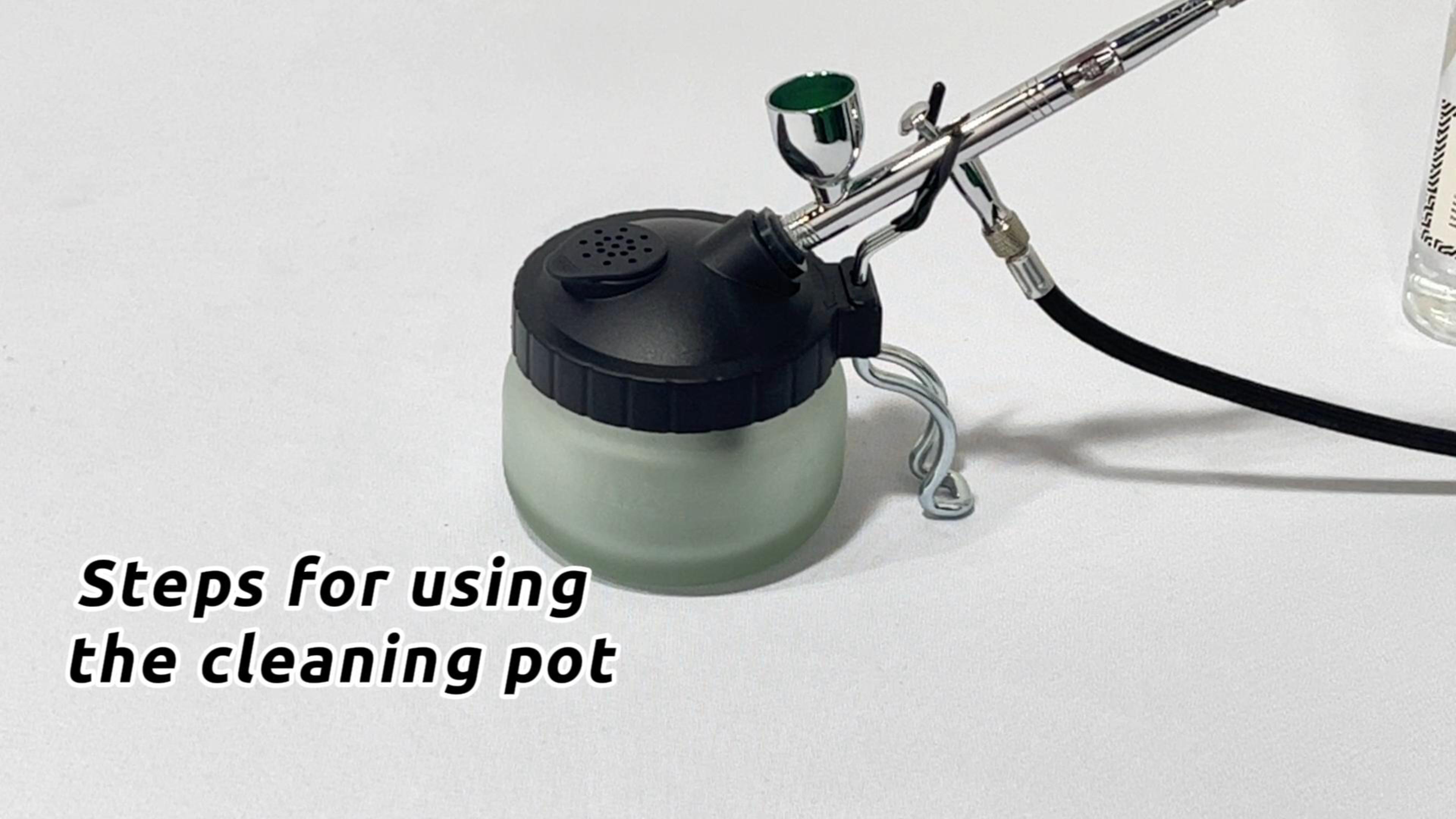 Iwata Universal Spray Out Pot components laid out for assembly