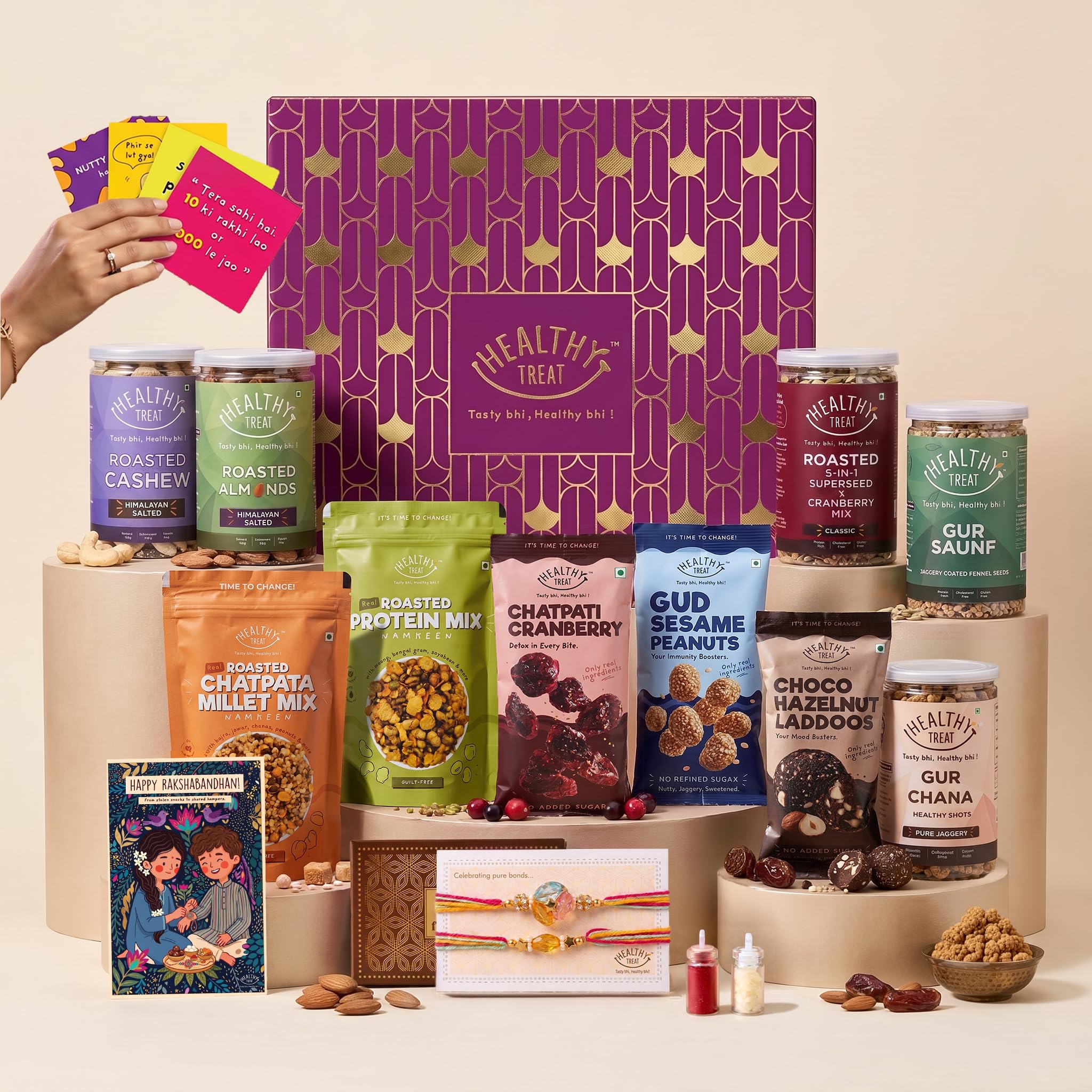 Healthy Treat Magic Rakhi Gift Hamper | Premium Raksha Bandhan Gift Box with Roasted Almonds, Cashews, 5 in 1 Seed Mix, Protein Mix, Millet Mix, Chocolate Hazelnut Laddoo, Gud Chana, Handmade Rakhi Pair, Roli Chawal & Greeting Card | Healthy Festive Gift-image-10