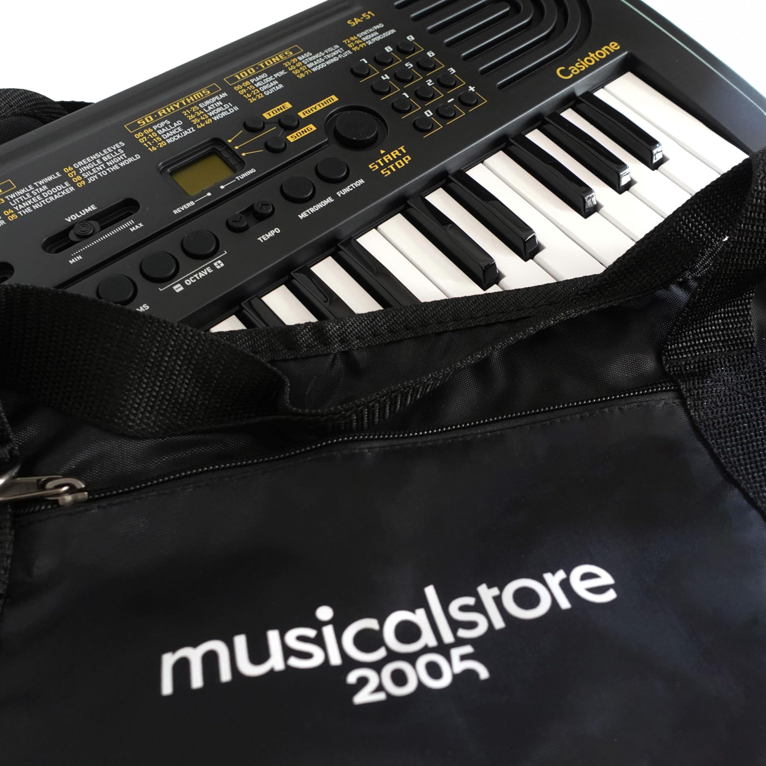 Kit Tastiera SA-50, Borsa e Tracolla e Alimentatore Compatibili, Mini Tastiera 32 Tasti Polifonica 8 Voci, Nero/Bianco - Perfetto per Bambini e Studenti