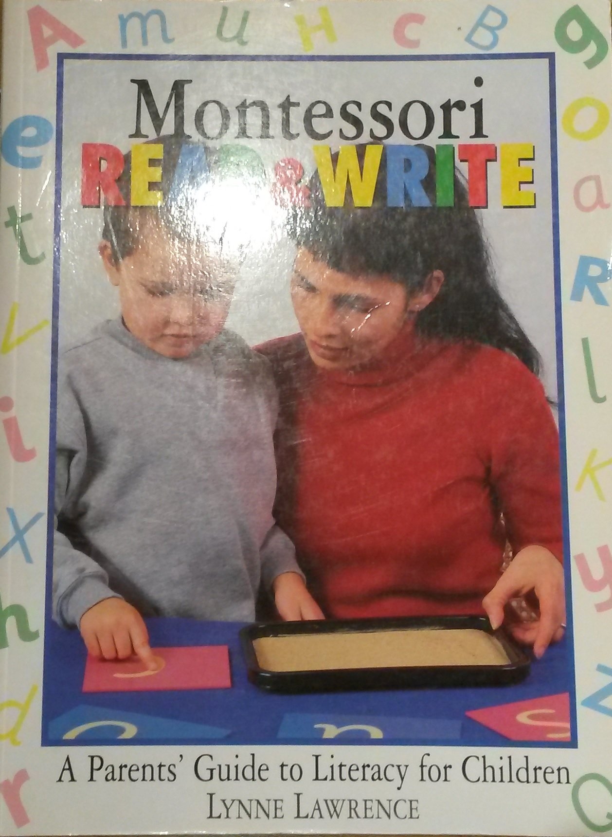 Montessori Read & Write: A Parents' Guide to Literacy for Children Paperback – August 1, 1998