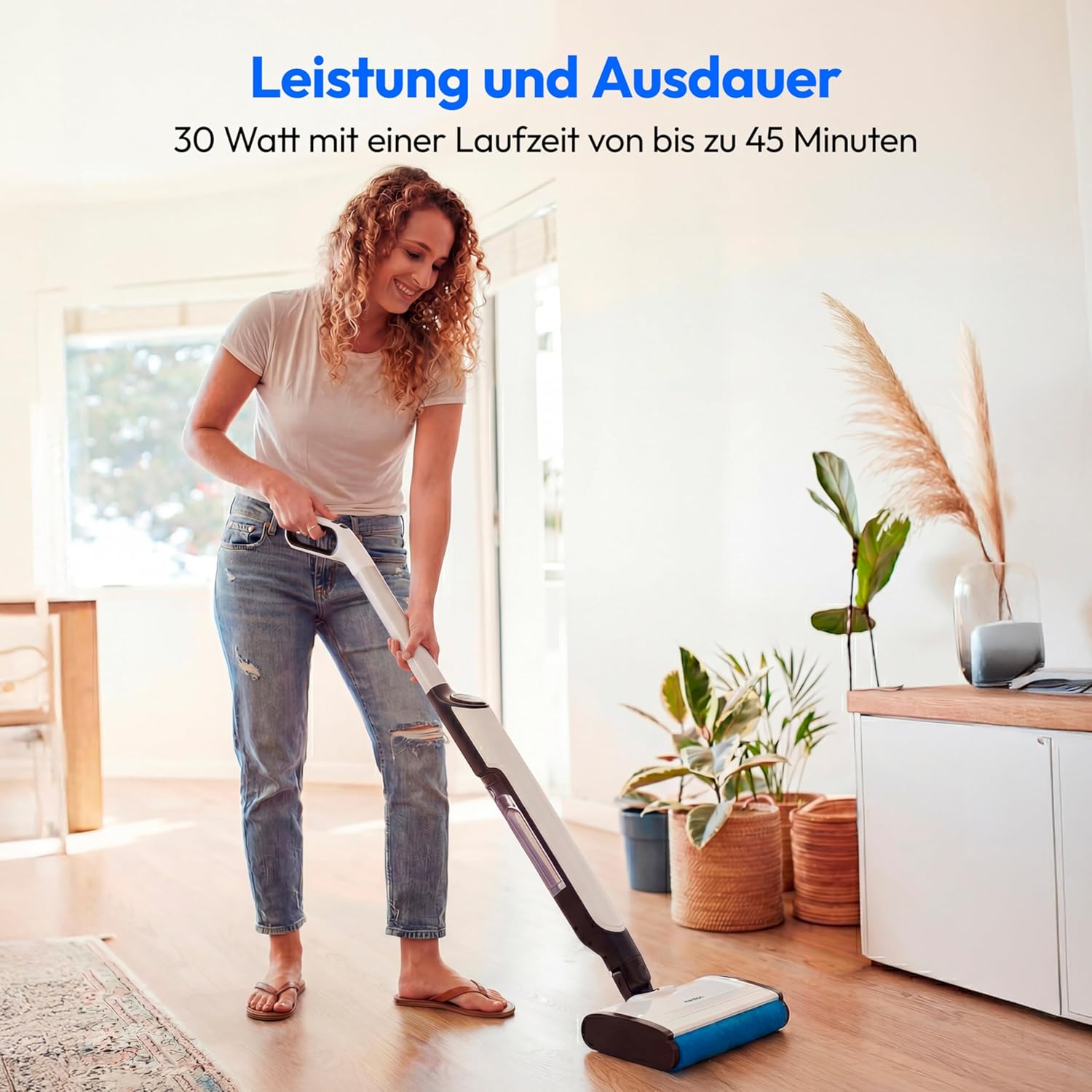 A woman using the MEDION H11 Cordless Floor Cleaner on a wooden floor in a living room setting.