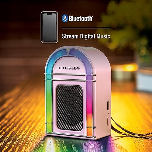 Miniatura 4 de Crosley CR3046A-PI Mini Jukebox Altavoz Bluetooth portátil con luces LED y micrófono, rosa