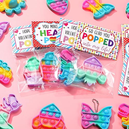 Miniatura 4 de Qinline Paquete de 24 recuerdos de fiesta para niños, juguete sensorial de dinosaurio con tarjetas de regalo para niños y niñas, regalos de