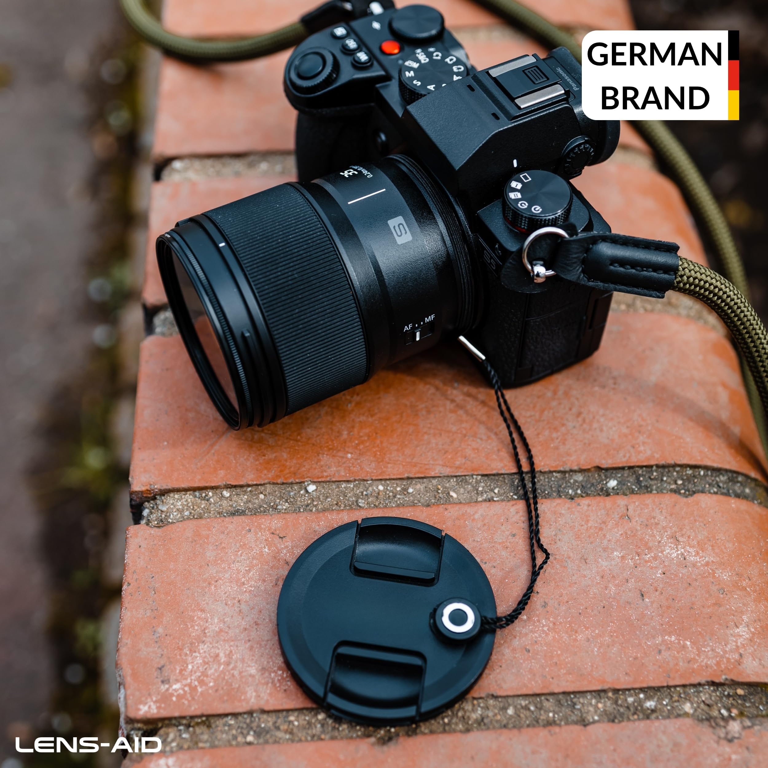 Lens-Aid - Cordon avec adhésif pour Cache-objectifs - avec adhésif en Caoutchouc Universel, Convient à Canon, Nikon, Fuji, Tamron, Sigma, Olympus, Pentax (Set de 5 pcs)