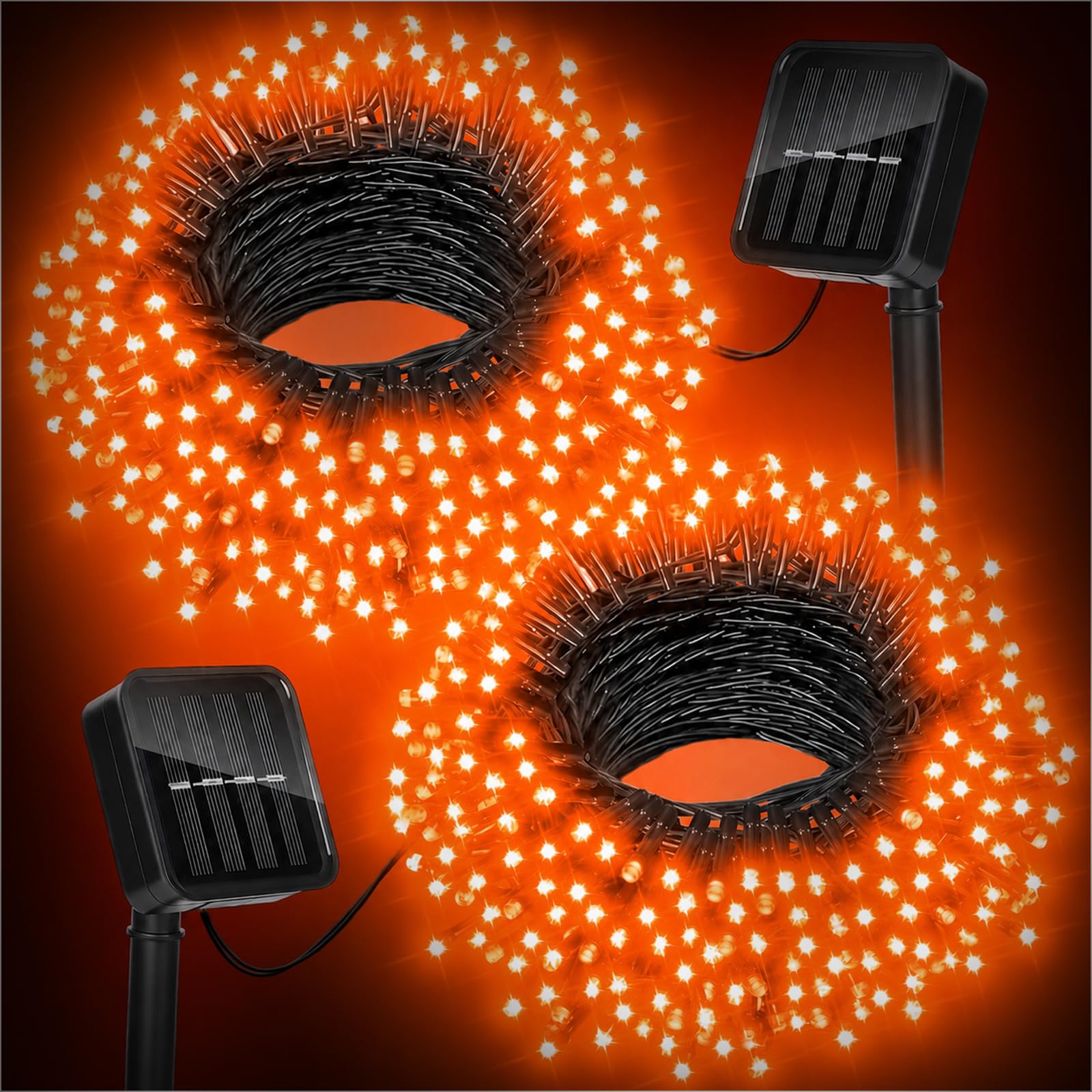 Best Halloween String Lights — Indoor & Outdoor Magic 4 Moettany solar Halloween string lights orange and purple glowing along a garden fence at dusk