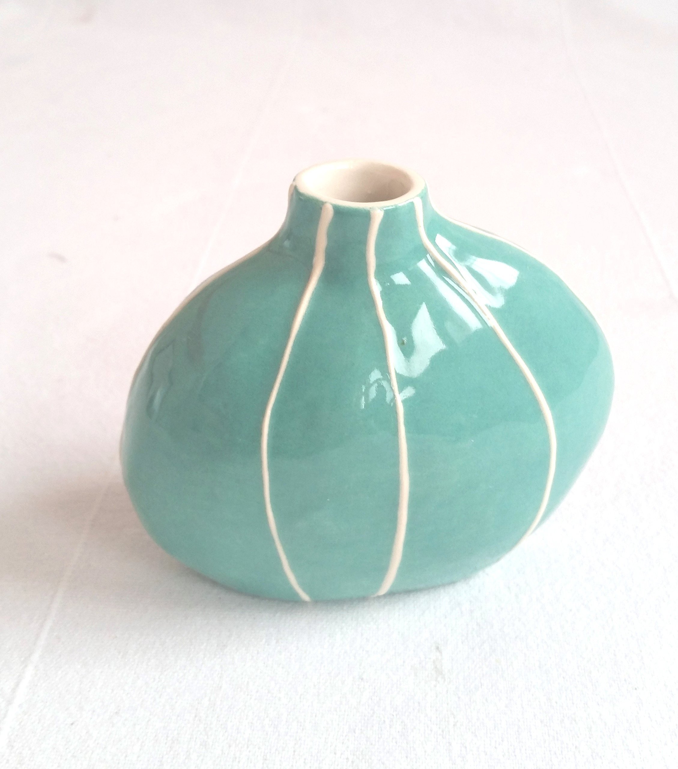 Budvase from Kri Kri Studio. Small round organic form. Simple modern style. Jade green with raised white stripes.