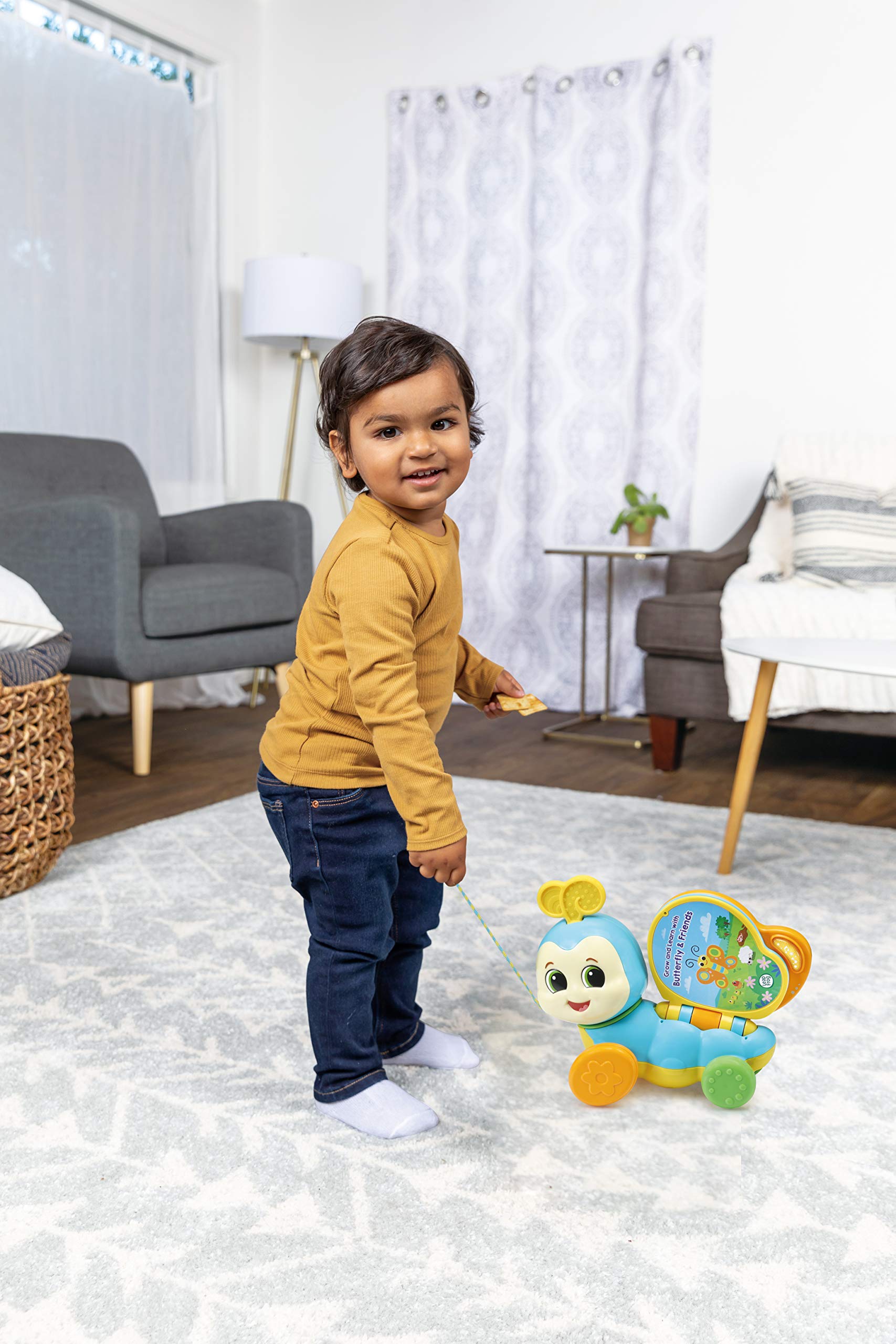 LeapFrog Livre papillon à tirer - Trotteur éducatif avec phrases et chansons, livre d'apprentissage de bébé, jouets d'apprentissage préscolaire, jouet musical pour bébé, à partir de 12 mois