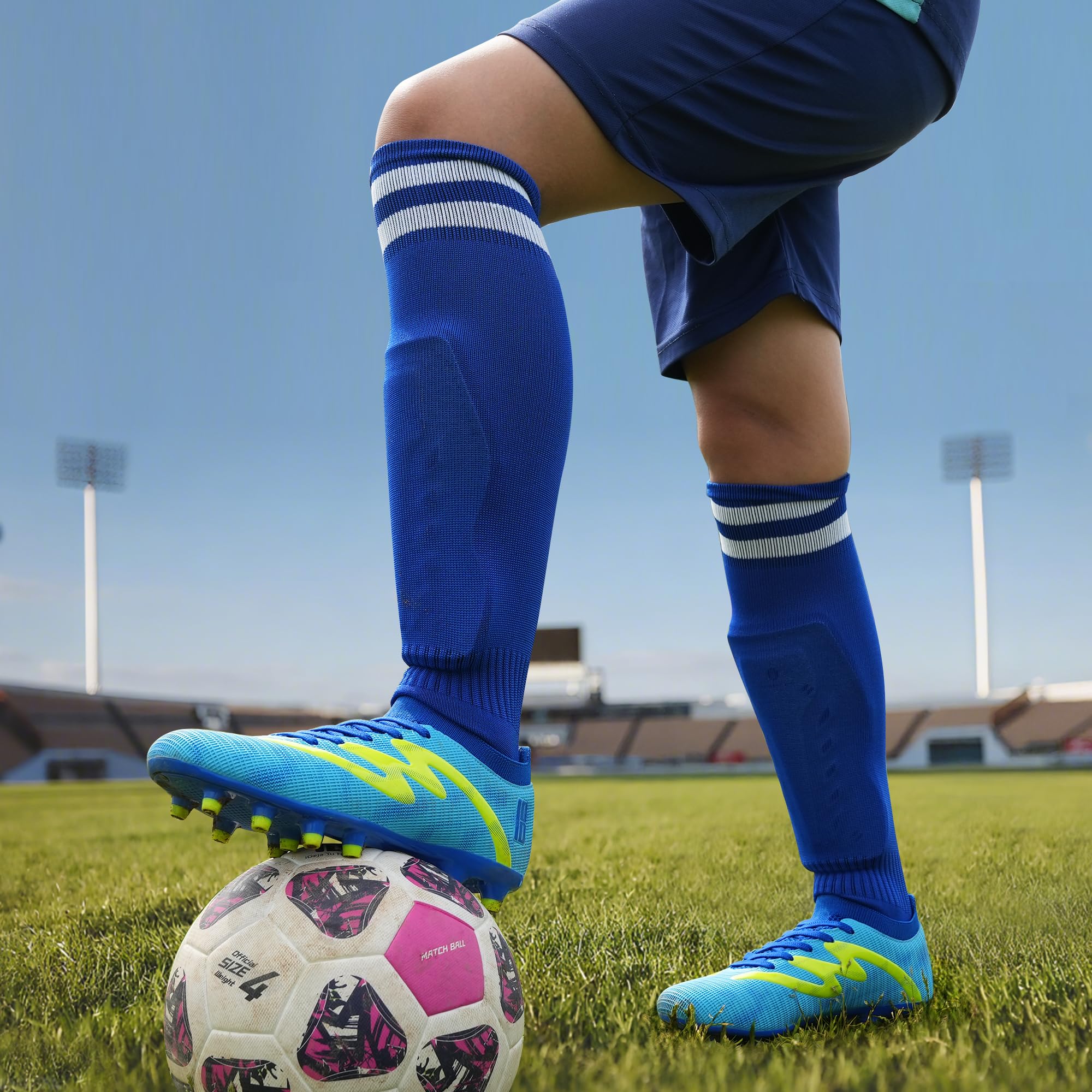 JABASIC Kinder Fußballschuhe fürFirm Ground Jungen Mädchen Fußballschuhe mit Schienbeinschutzen und Fußballsocken