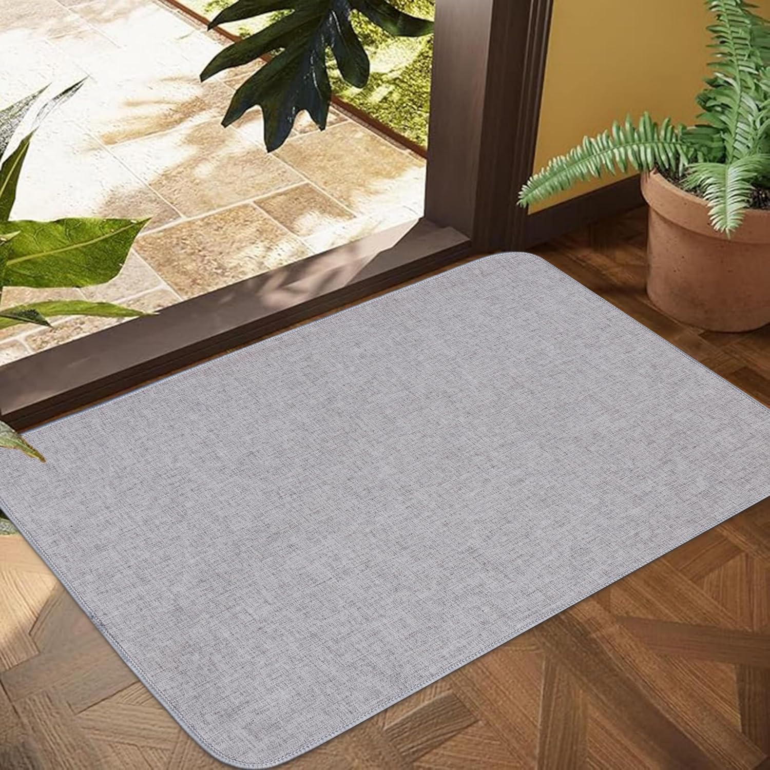 Tapis d'entrée discret et ultra fin pour éviter le blocage des portes