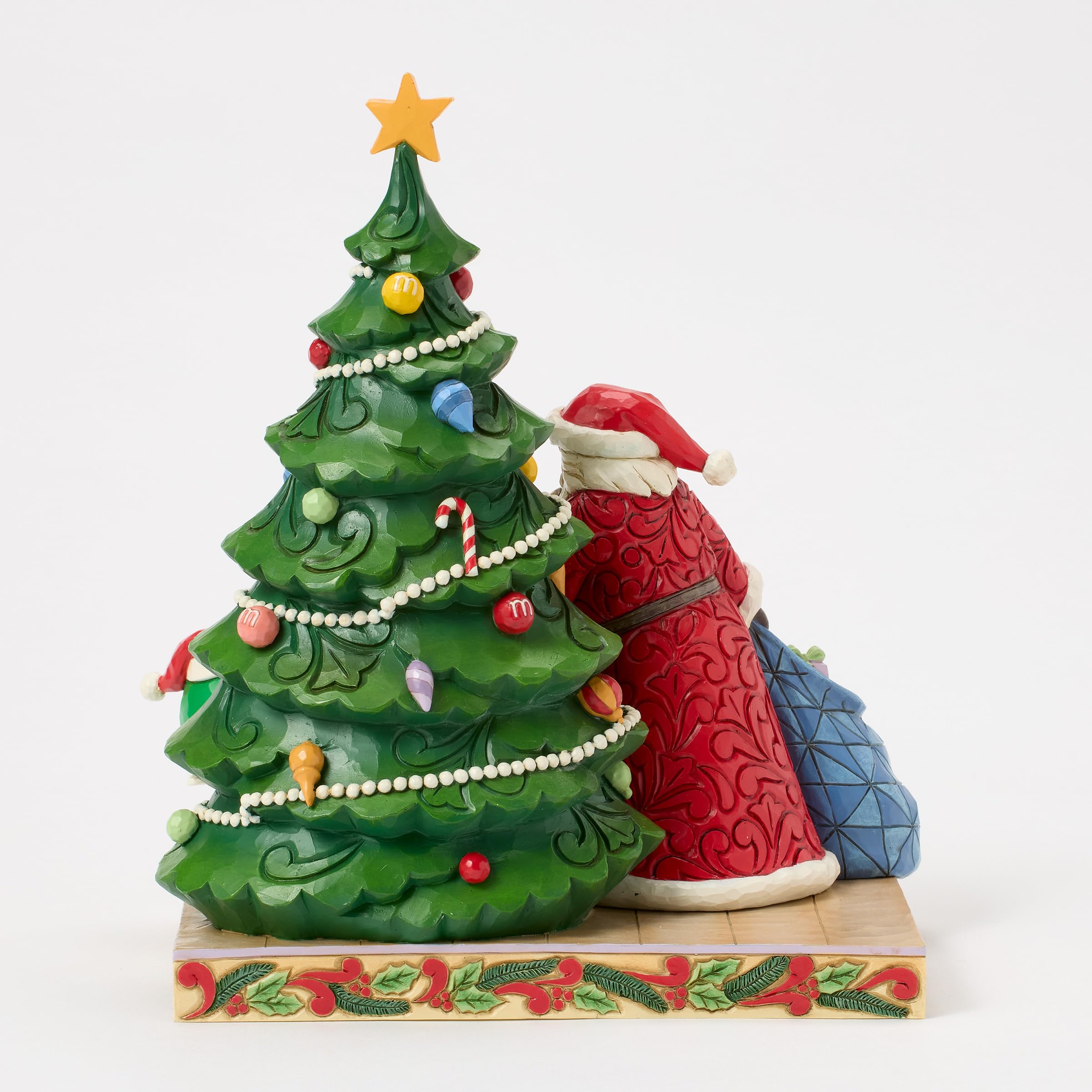 Enesco M&M's by Jim Shore Figurine de Père Noël avec Personnages Verts et Jaunes de Sapin de Noël, 21 cm, Multicolore