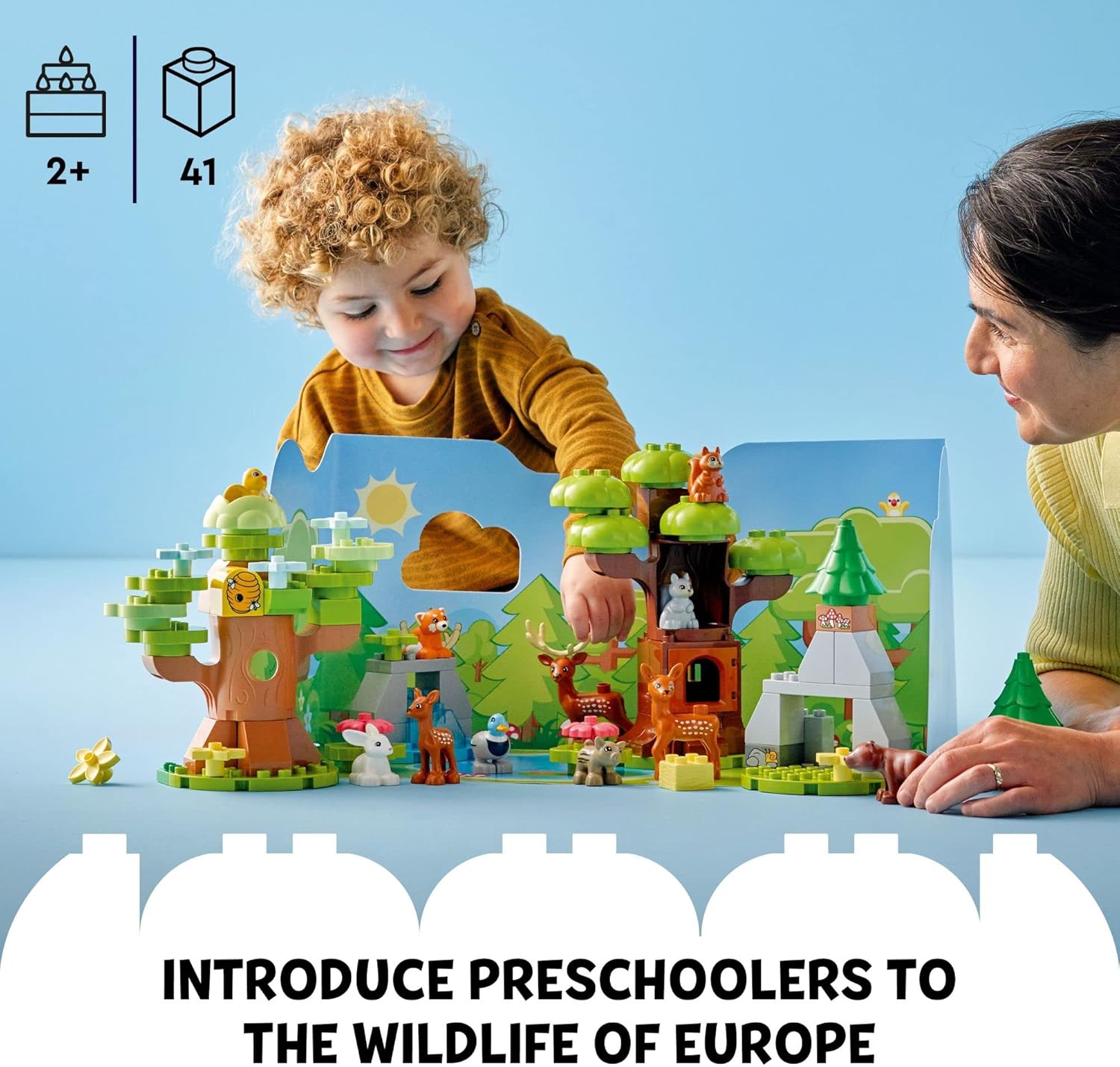 Adult and child playing with LEGO DUPLO Wild Animals of Europe set on a playmat