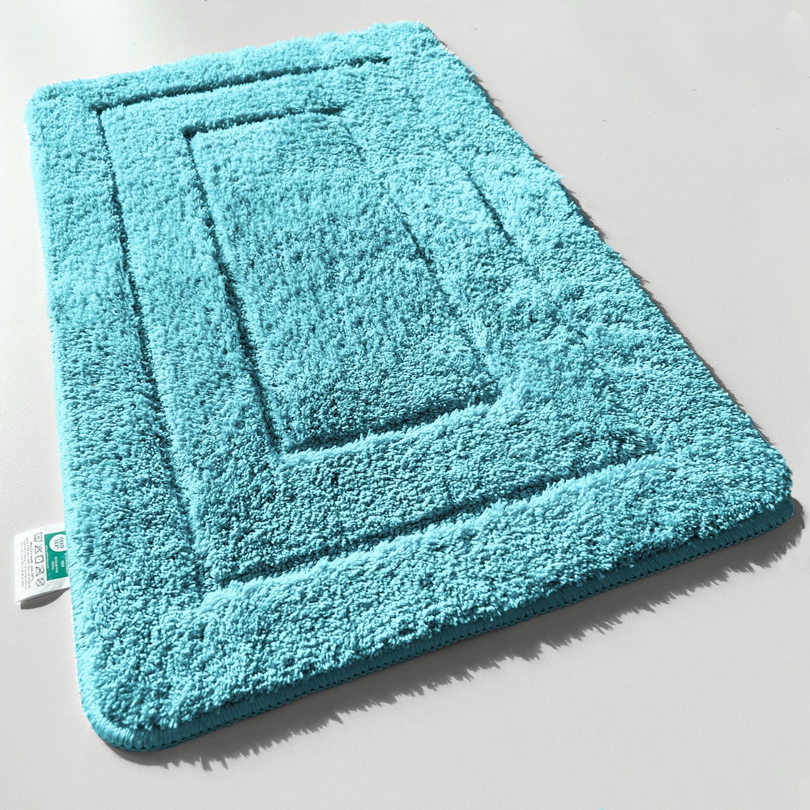 KARAT Badteppich Atlantis - extra flauschig & schnelltrocknend - Badezimmerteppich mit rutschsicherer Rückseite - Badematte Duschvorleger (Türkis, 50 x 80 cm)