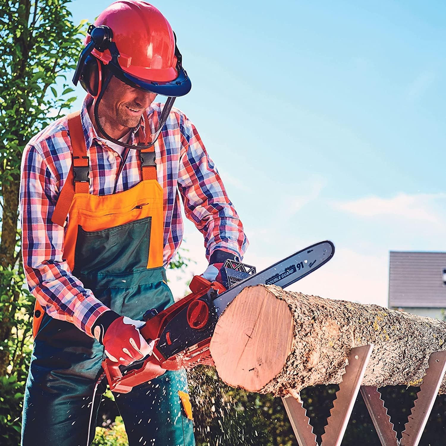 User operating Einhell Electric Chainsaw