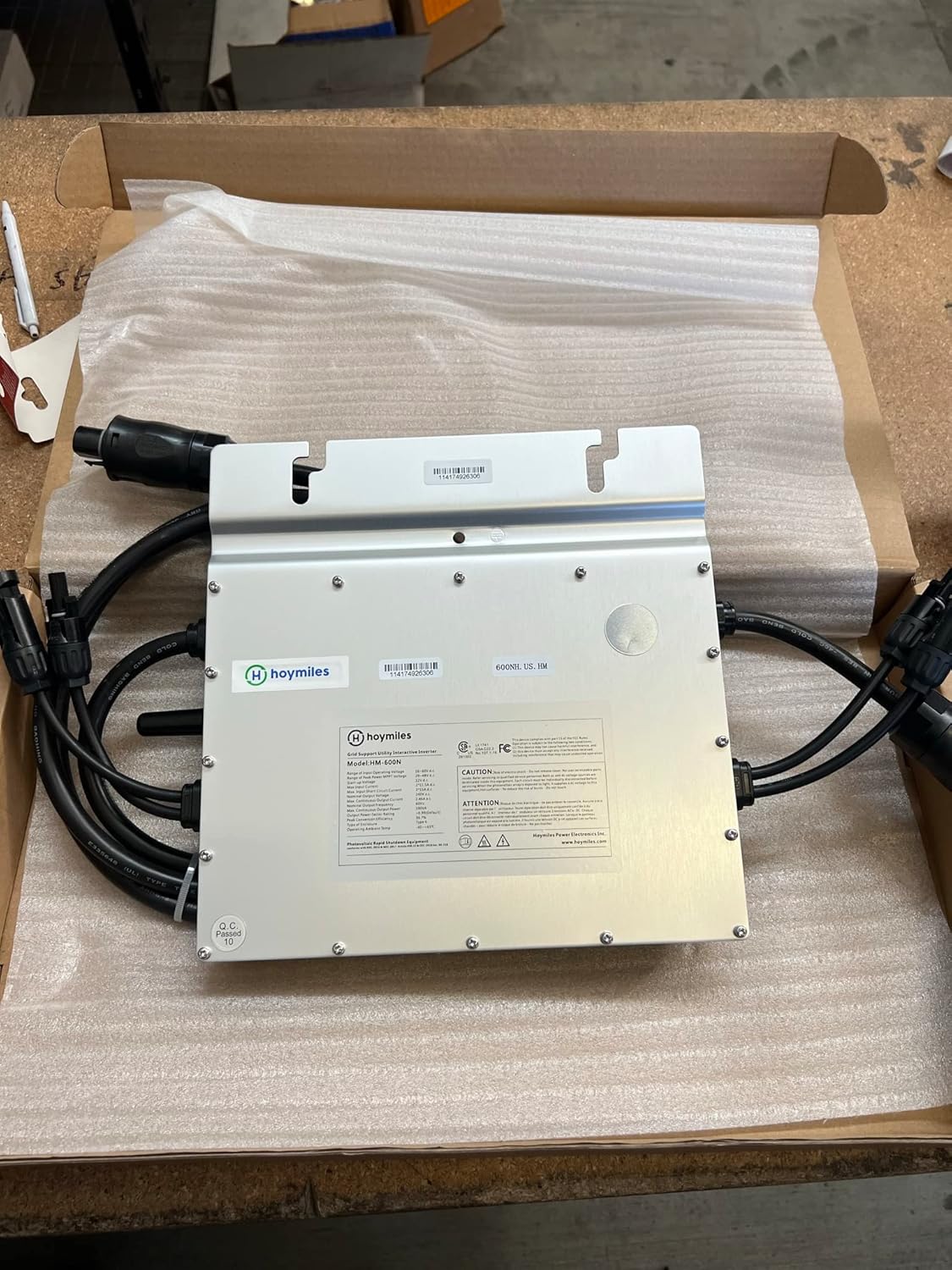 Hoymiles HM-600N Microinverter in packaging, top view