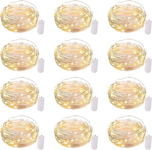 Brightown Paquete de 12 luces de hadas que funcionan con pilas, cable plateado de 7 pies, luces de luna estrellada luciérnaga, mini luces LED de