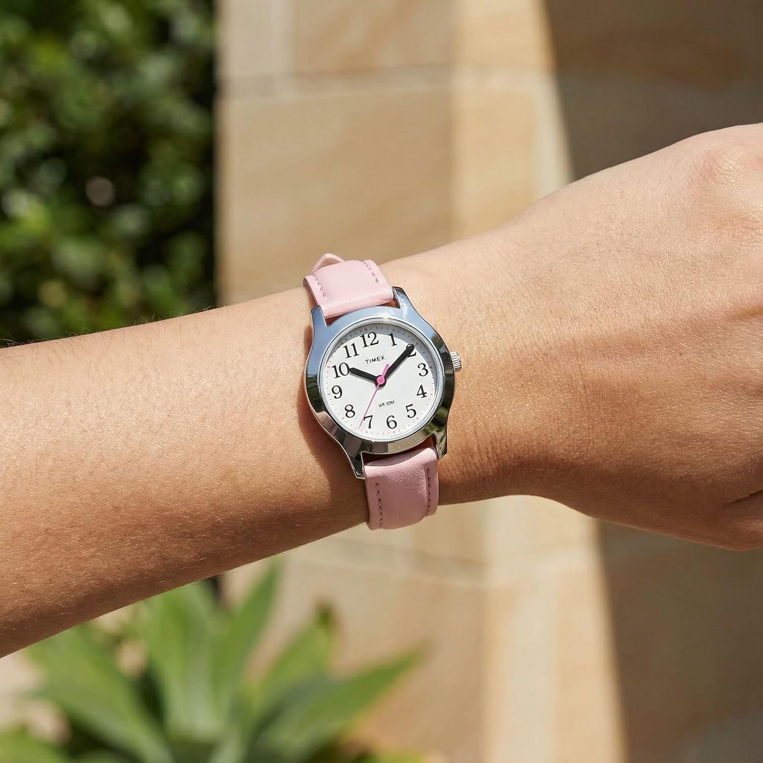 Timex TIME Machines 24mm Pink Strap Watch on a wrist