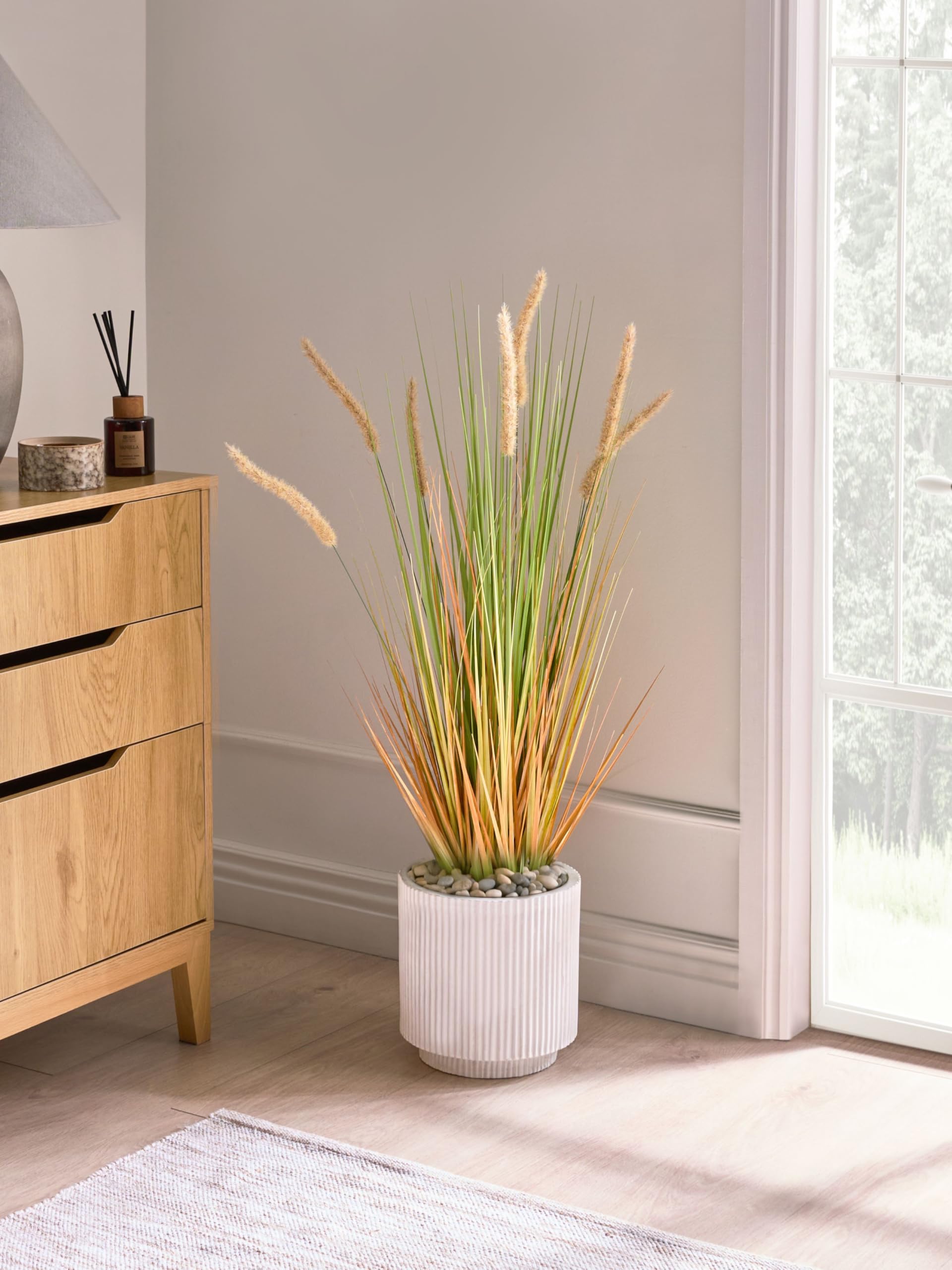 Beliani Planta Artificial en Maceta para Interior decoración de plástico con Maceta Negra 90 cm Hojas Verdes y Junco Naranja Bristlegrass