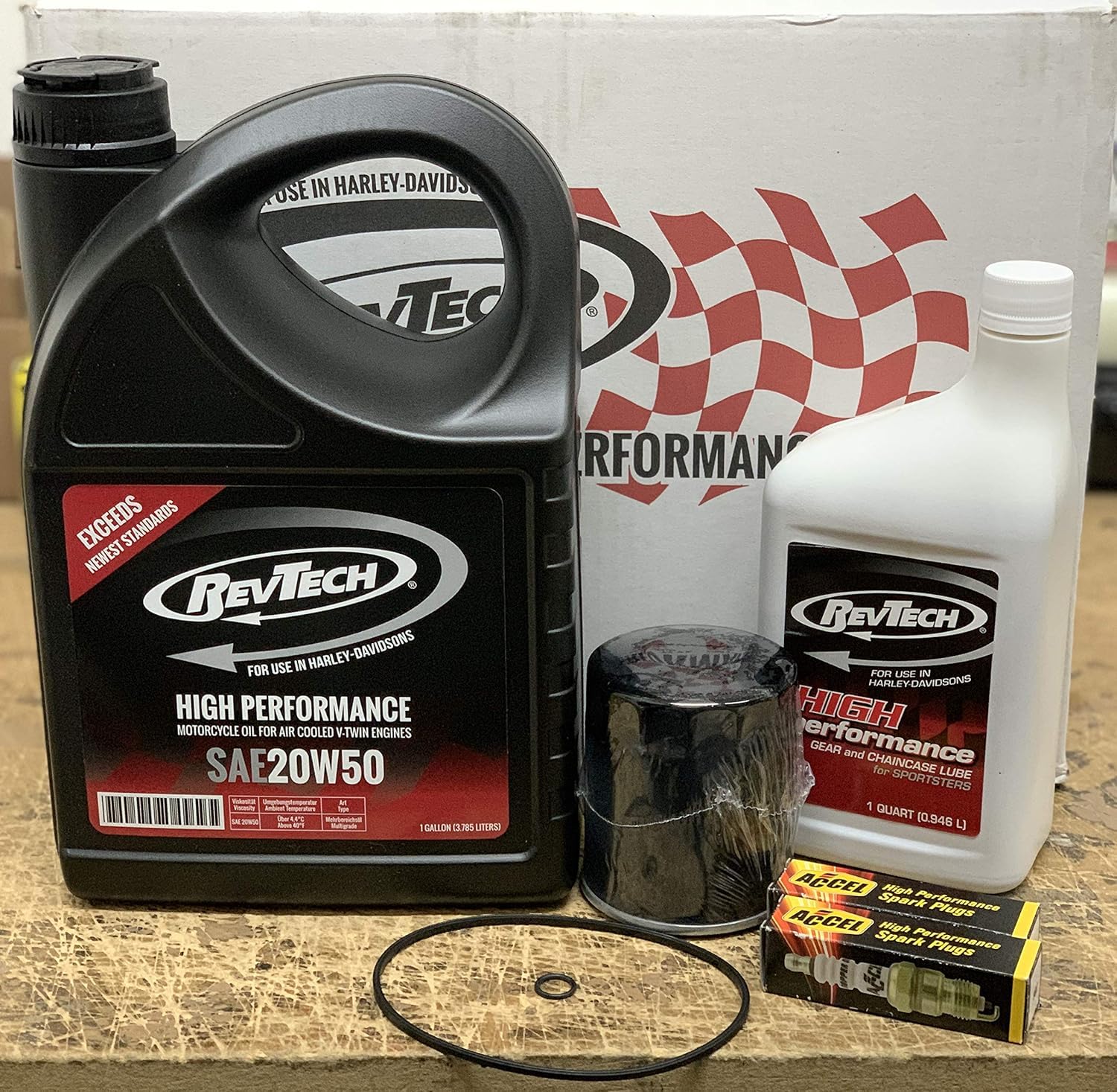 Kit Tagliando RevTech High-Performance Garanzia Compatibile con HARLEY Olio Motore Olio Trasmissione/Primaria Candele Accel Filtro Omaggio Guarnizioni per Sportster dal 1984 a Oggi 883 1200...